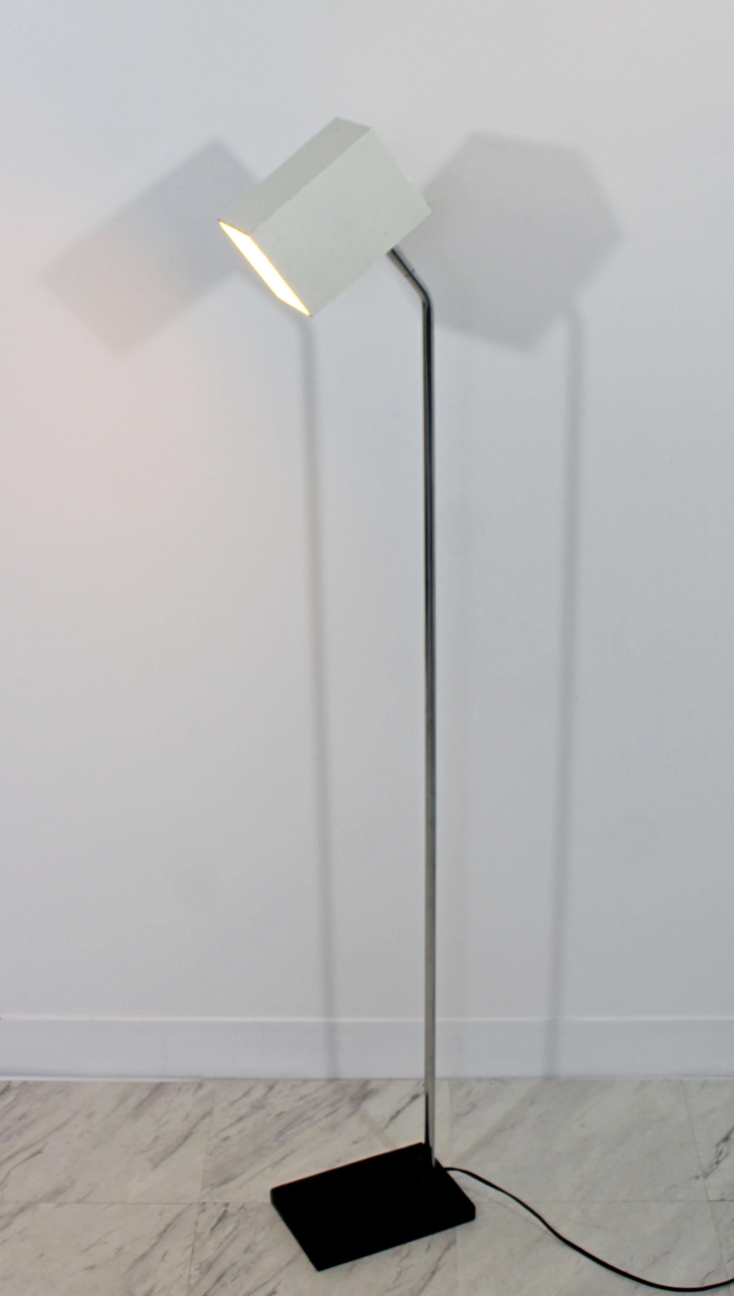 For your consideration is a fantastic, chrome floor lamp, with a white adjustable head, by Robert Sonneman, circa the 1970s. In very good condition. The dimensions are 8