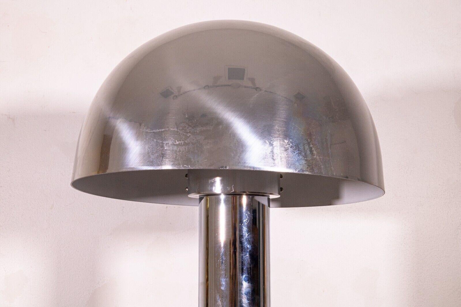 A contemporary modern Robert Sonneman for Laurel chrome mushroom floor lamp. A super cool retro modern floor lamp featuring a full chrome finish, a mushroom shade design, and a dimming light. This piece is corded electric. The top lamp shade can be