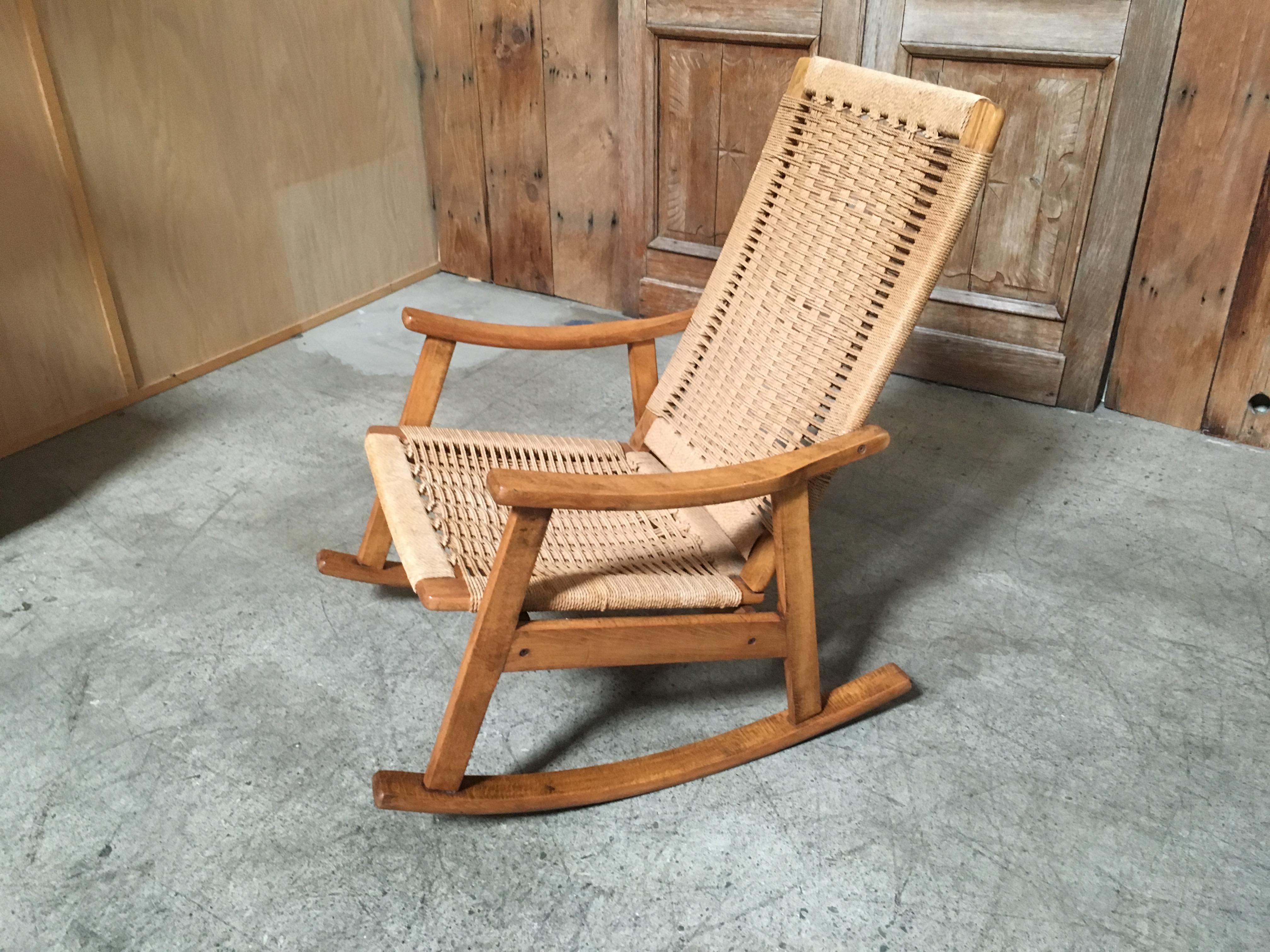 Danish Modern style rocker with rope (cord) seat and back and beechwood frame made in Yugoslavia.