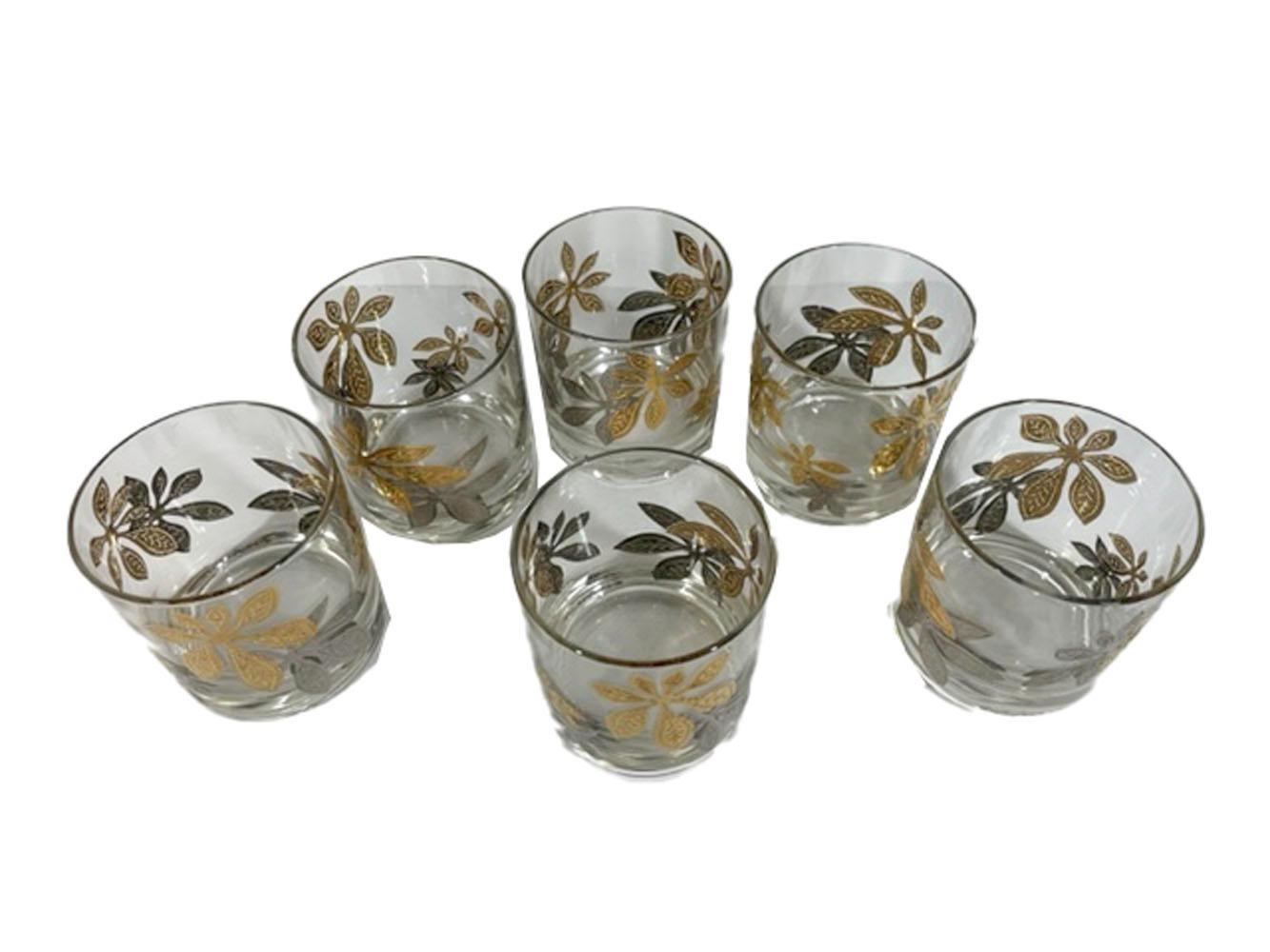 Sic Mid-Century Modern rocks glasses by Culver, LTD. decorated with 22k gold and silver clusters of leaves.