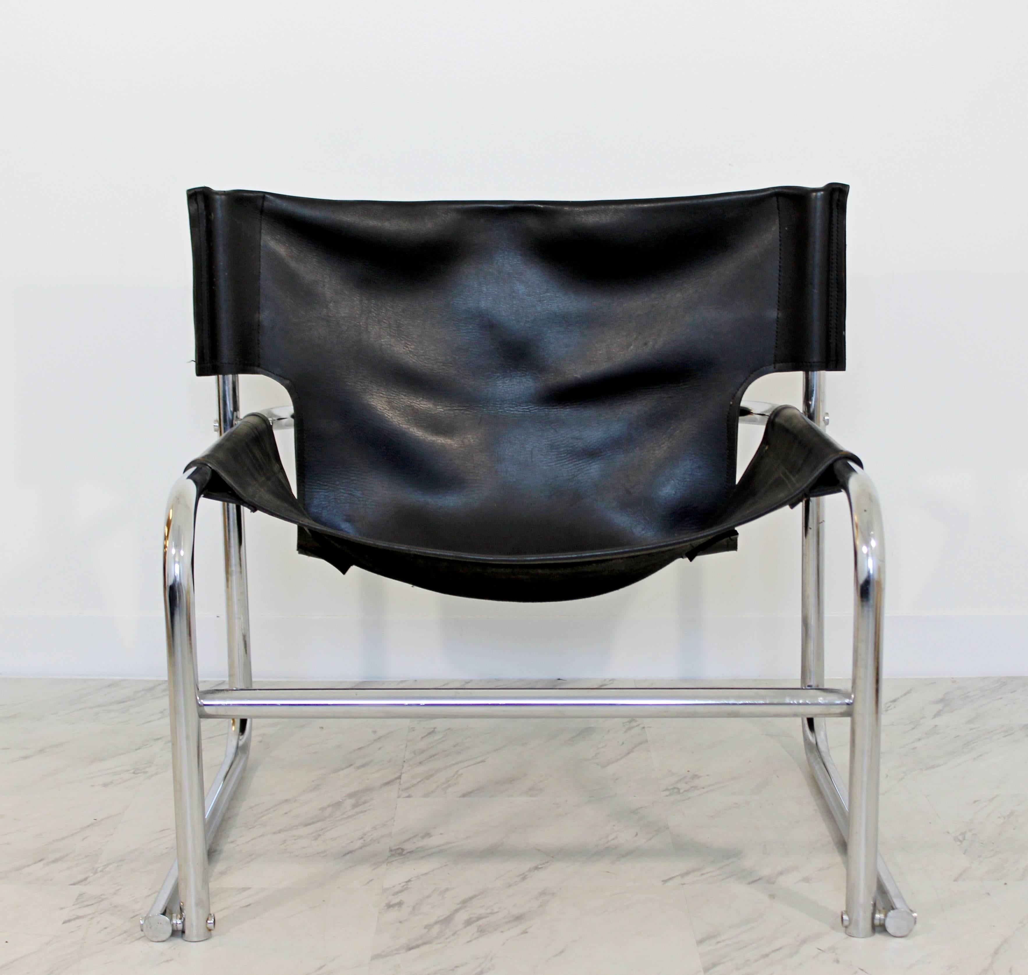 For your consideration is a magnificent, tubular chrome sling armchair, with black leather upholstery, by Rodney Kinsman, circa the 1960s. In very good condition. The dimensions are 30.5