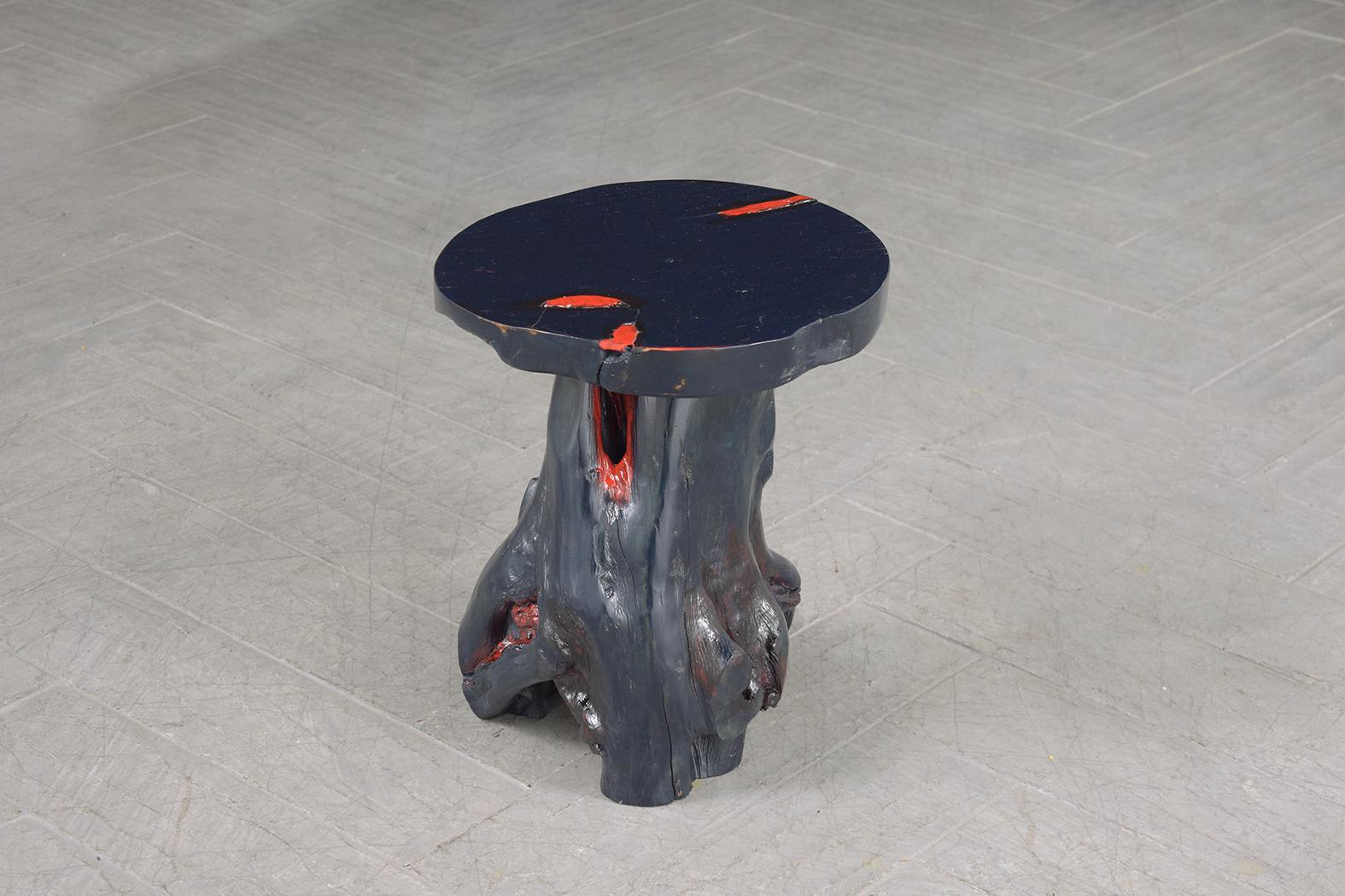 Embrace the elegance of the 1960s with our Organic Modern Style Free-Form Side Table. Expertly restored by our in-house craftsmen, this Mid-Century Modern root table is handcrafted from solid wood and boasts a unique design. The captivating navy