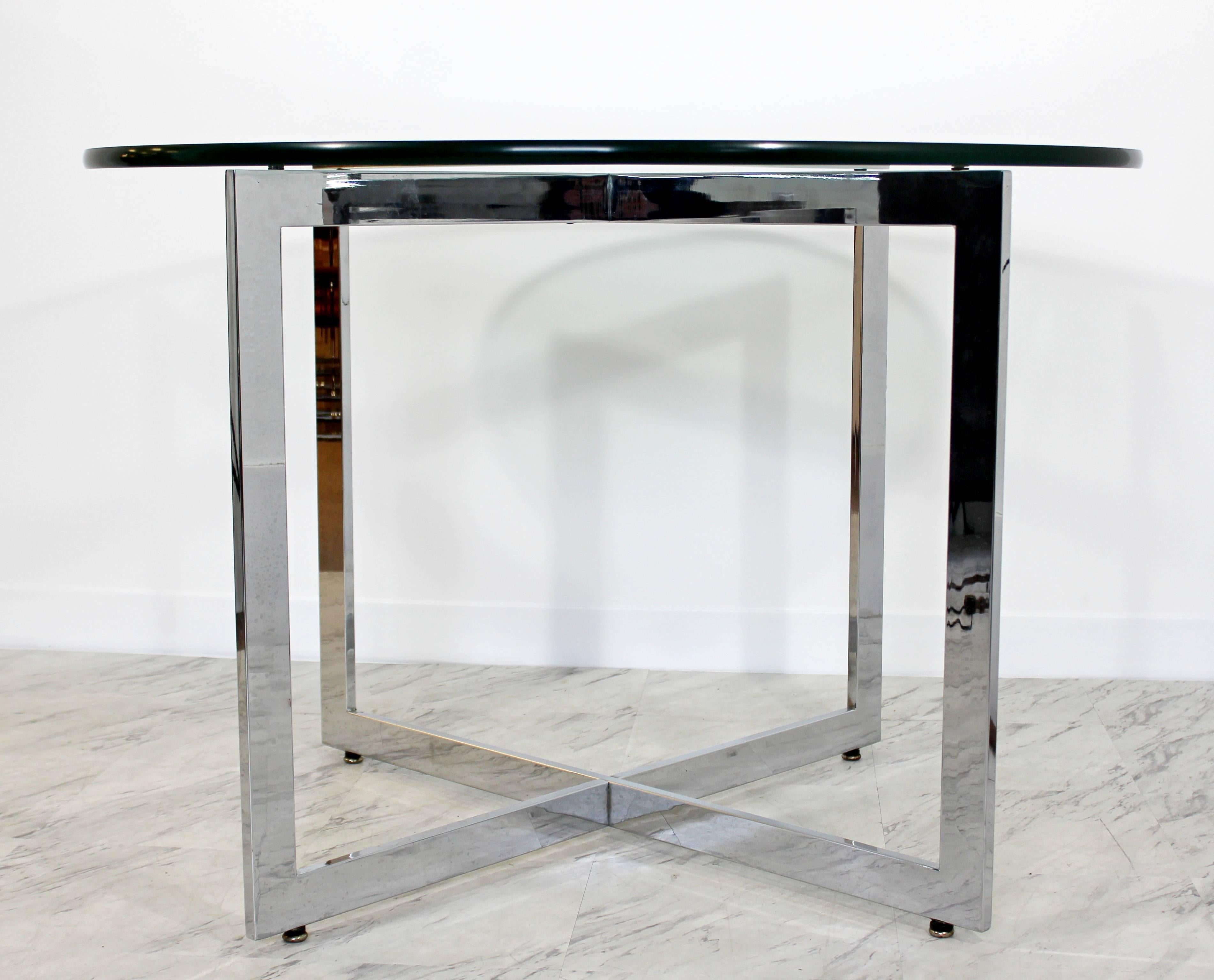 For your consideration is a fabulous dinette table, with a star-shaped chrome base and a circular glass top, by Leon Rosen by Pace, circa the 1970s. In excellent condition. The dimensions are 42