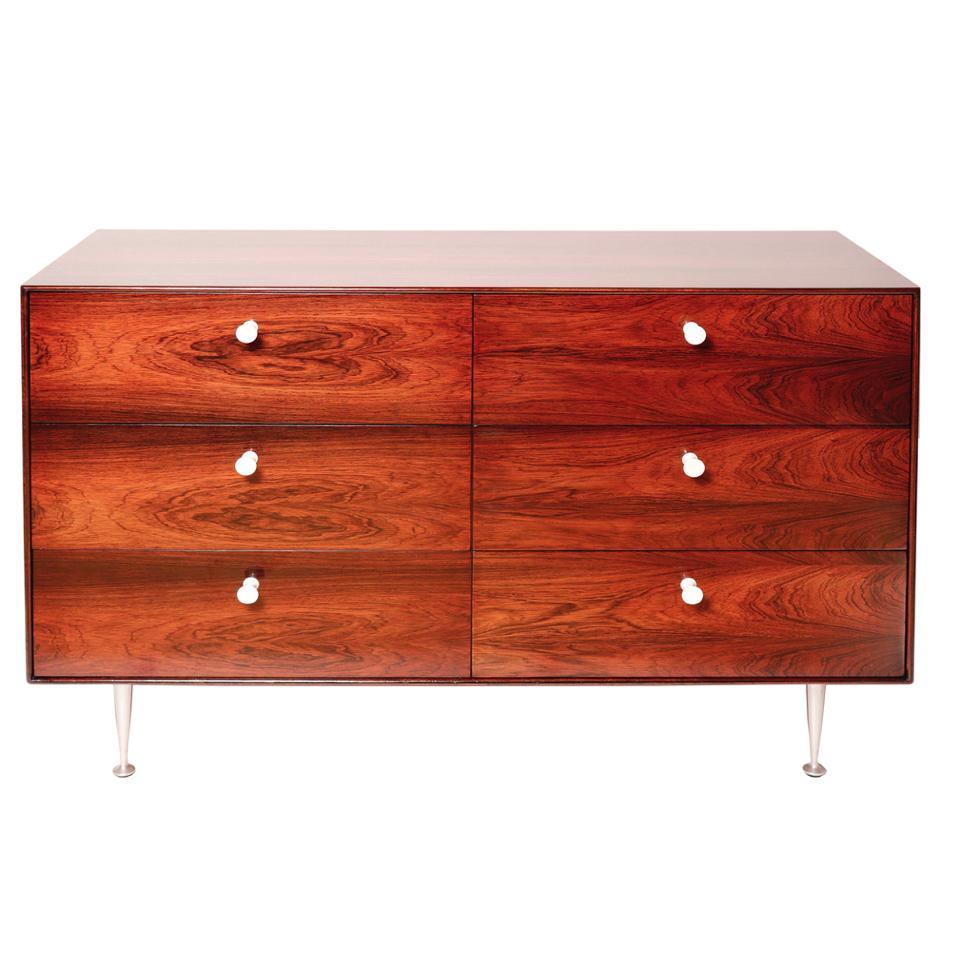 American Mid-Century Modern rosewood 6-drawer dresser, George Nelson & Associates for Herman Miller, Zeeland, Michigan. Six-drawer thin edge cabinet Model 5221, 1952. Rosewood veneered surfaces on four sides including the drawer faces, sides, top