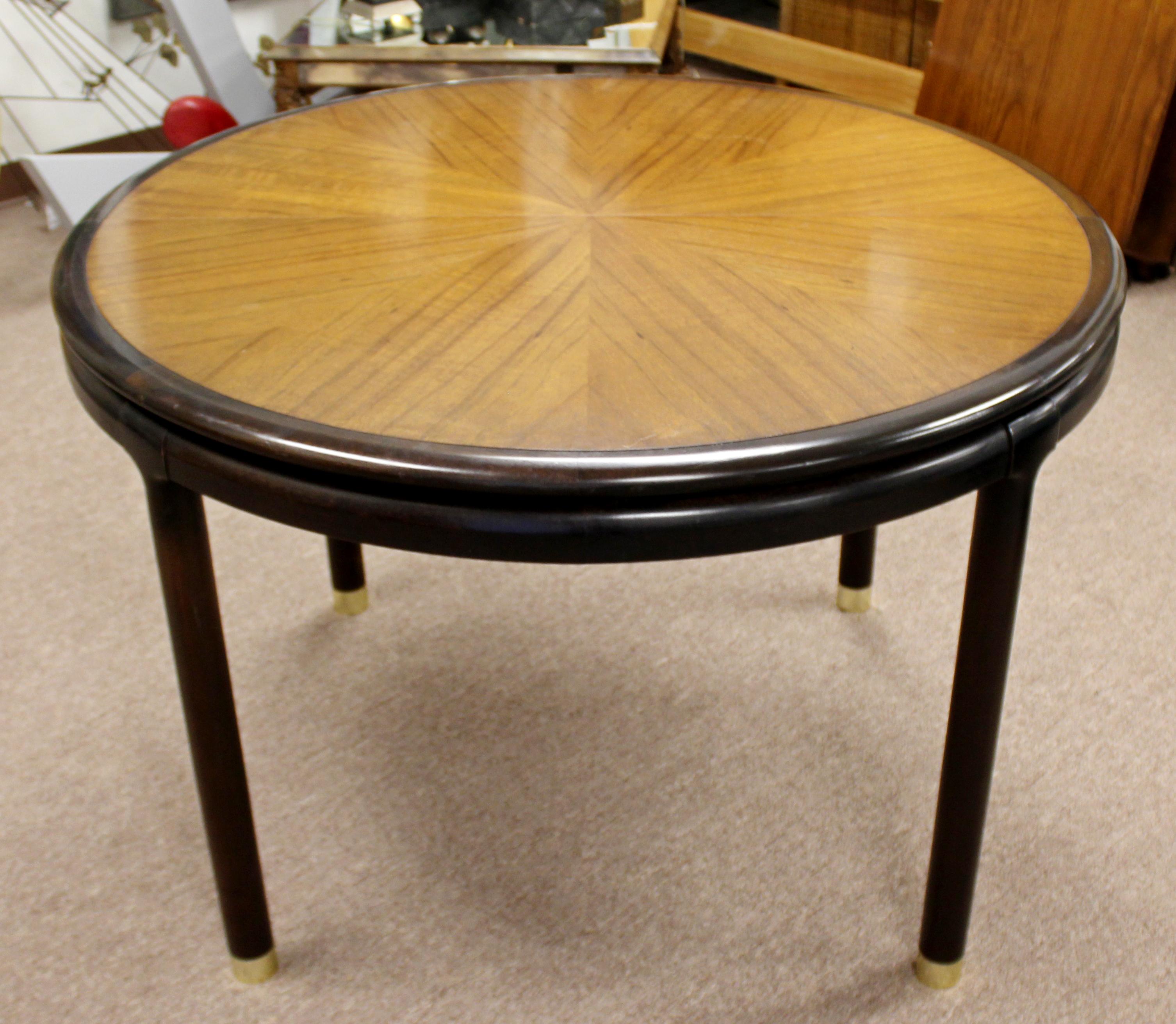 For your consideration is a fantastic rosewood dining or dinette table, with two leaves, attributed to Baker or Dunbar, circa 1960s. In very good vintage condition. The dimensions of the table are 44