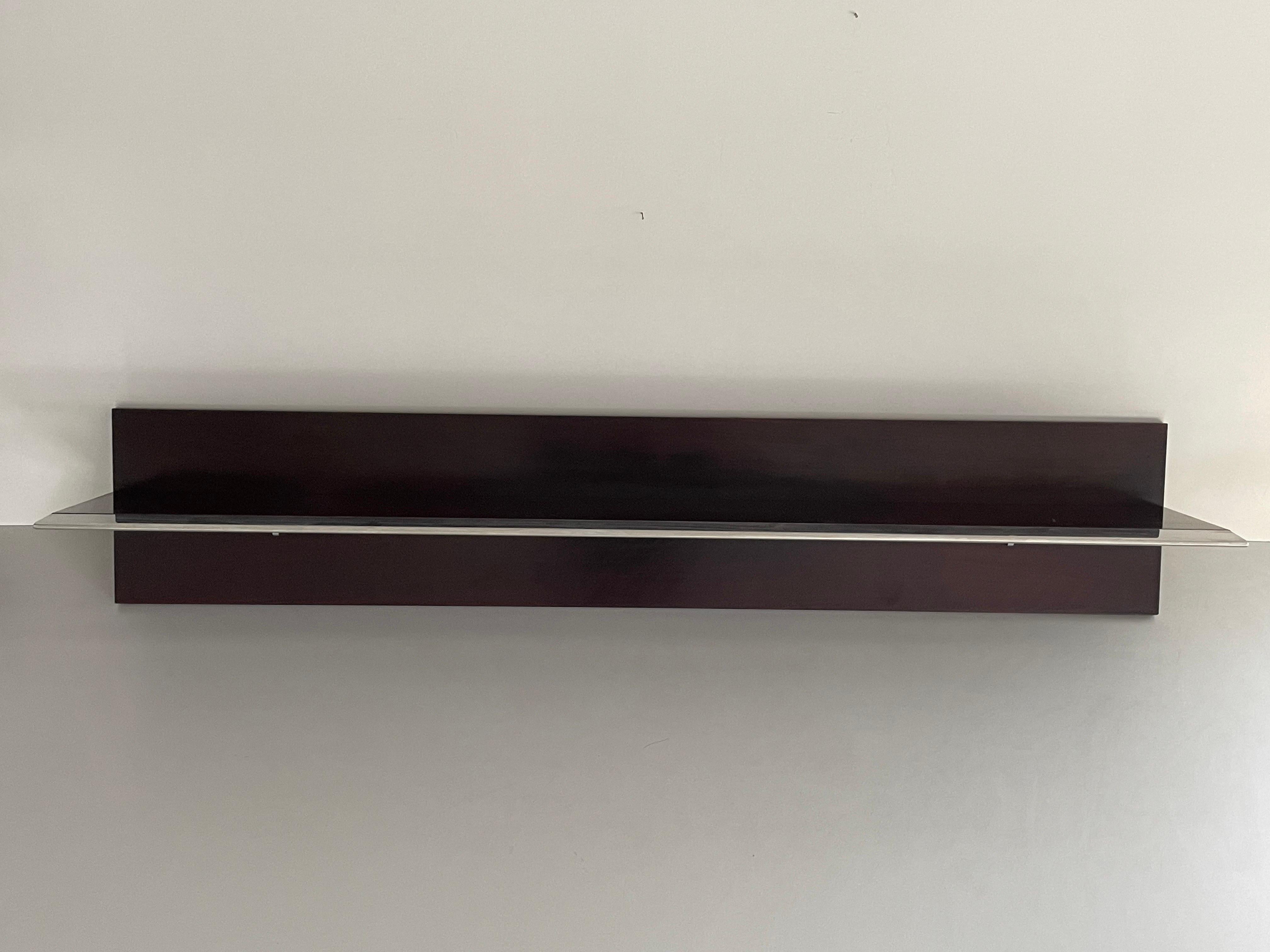 Mid-century Modern Rosewood Large Shelf Steel Cover by Saporiti, 1960s, Italy

No damage, no crack.
Wear consistent with age and use.

Measurements: 
Height: 28 cm
Width: 150 cm
Depth: 32 cm
