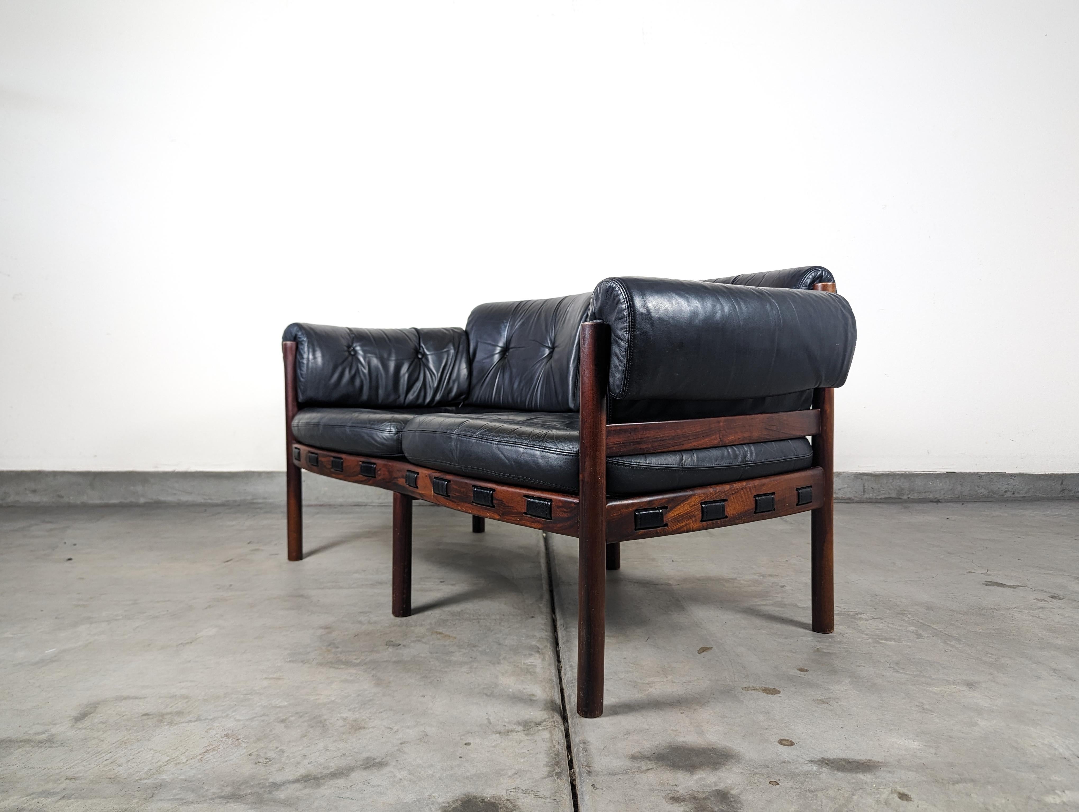Swedish Mid Century Modern Leather & Rosewood Loveseat by Arne Norell, c1960s For Sale
