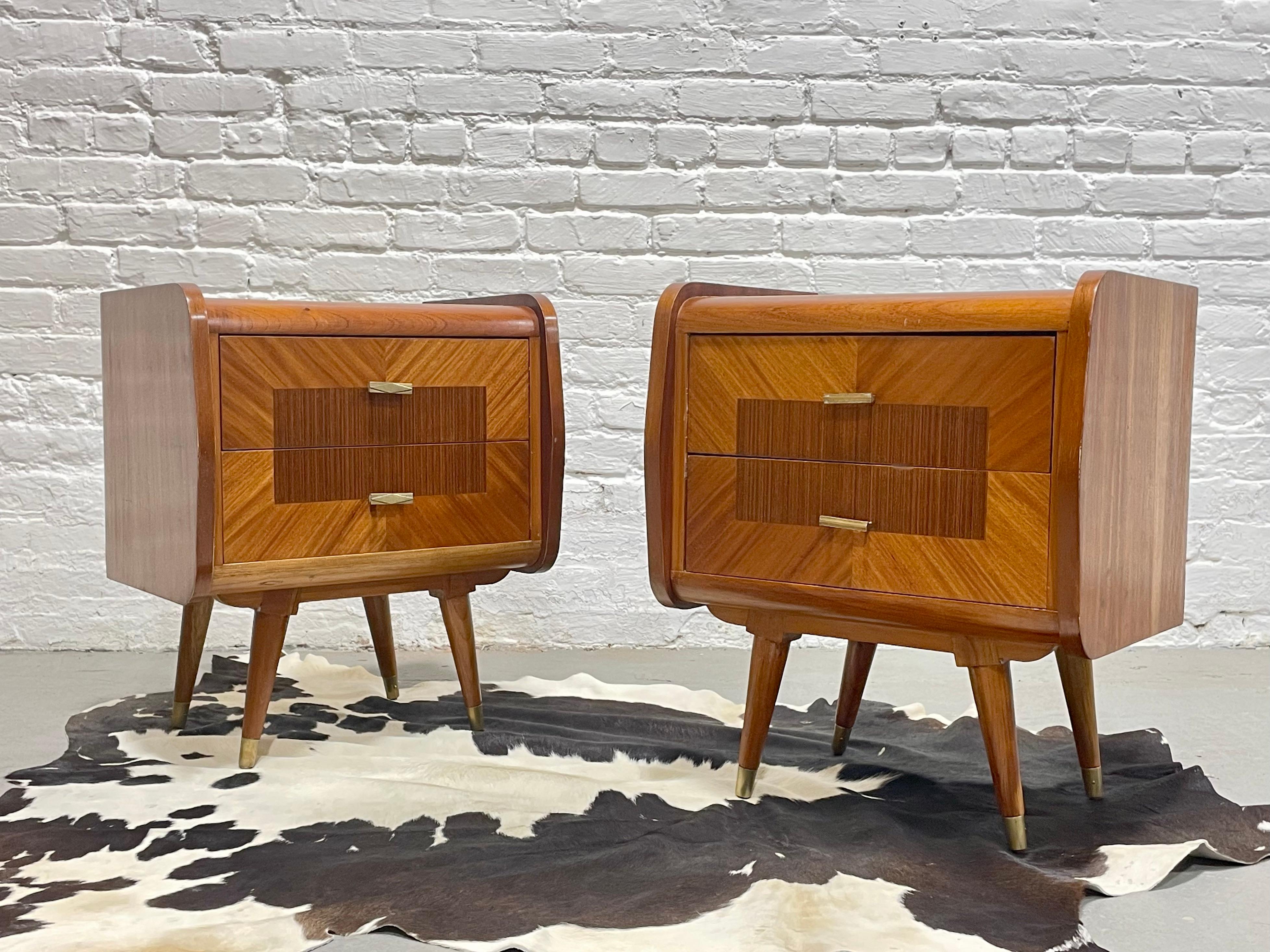 One of a kind French Mid Century Modern Rosewood + Mahogany nightstands, c. 1950's. This superbly crafted set offers unique contrasting rosewood and mahogany wood coloring and patterns. The design is superb as are all the delicious details such as