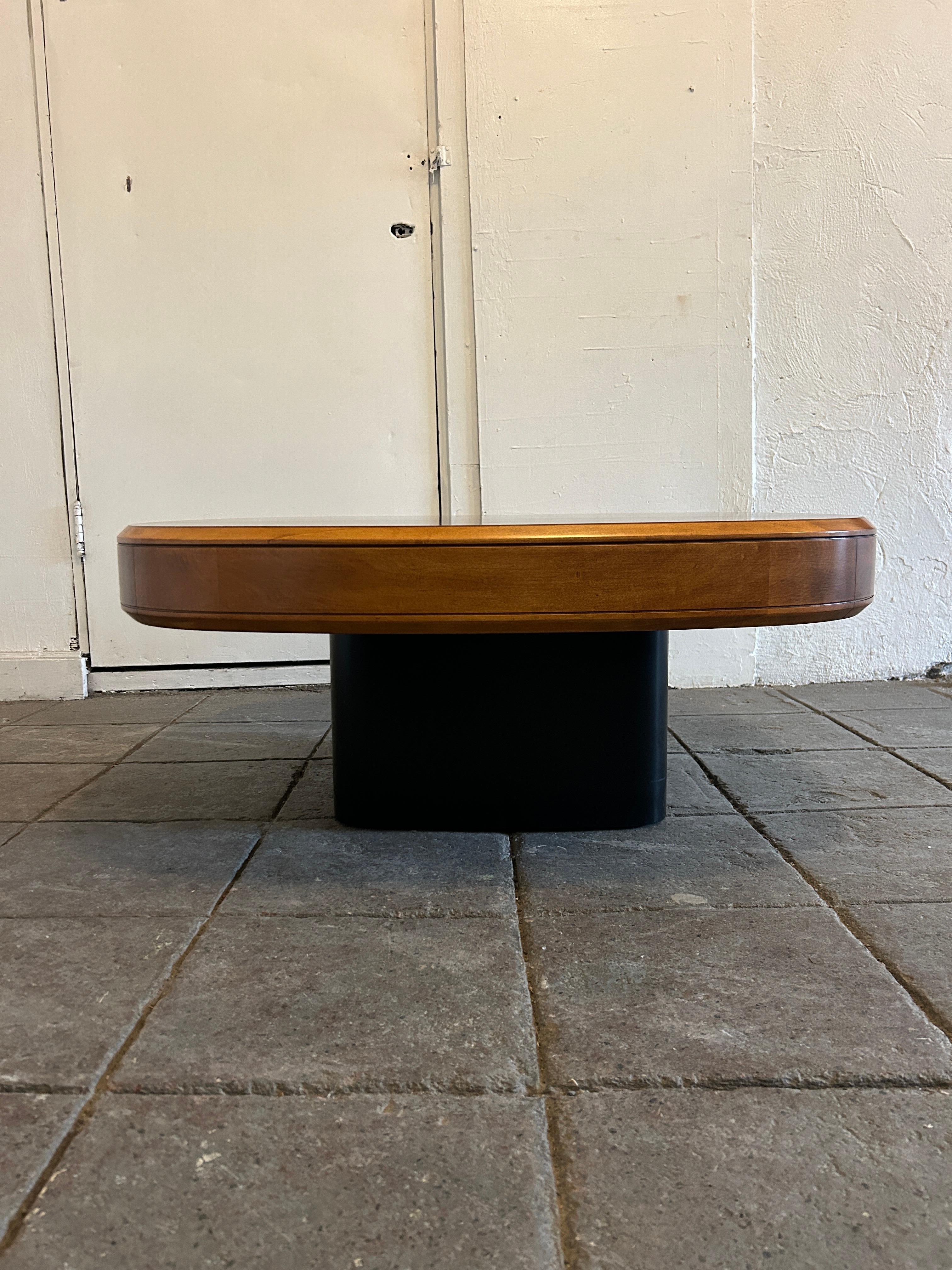 Mid century modern Exotic Rosewood round drum coffee table Milo Baughman. Beautiful coffee or cocktail table with stunning rosewood grain top with blonde wood apron that sits on a black lacquer square base. Made in USA located in Brooklyn NYC.