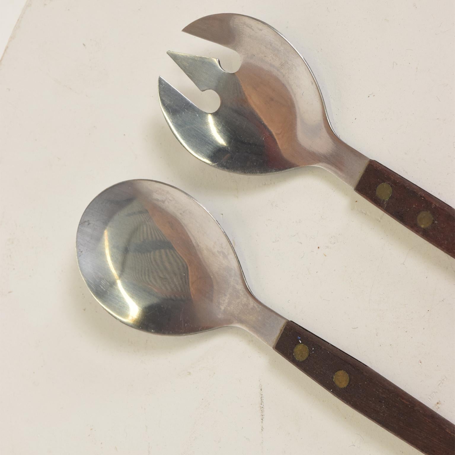 For your consideration, a Mid-Century Modern rosewood and stainless salad servers set. Made in Japan, the 1960s.
 