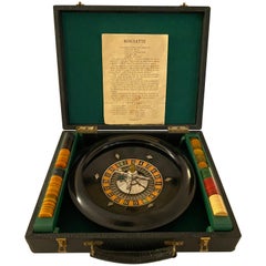 Vintage Mid-Century Modern Roulette Set with Bakelite Handle and Chips in Leather Case