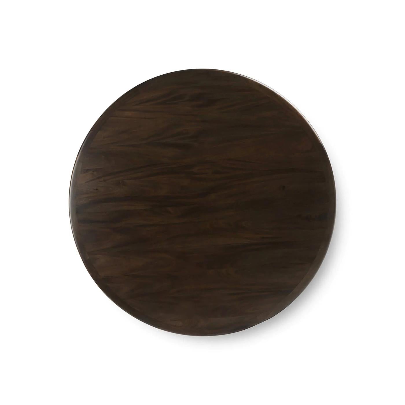 Crafted from solid mahogany and finished in a rich dark walnut stain, this table balances timeless craftsmanship with standout design. The centerpiece is its pedestal base—a rippling, tiered column composed of stacked, rounded discs, echoing the