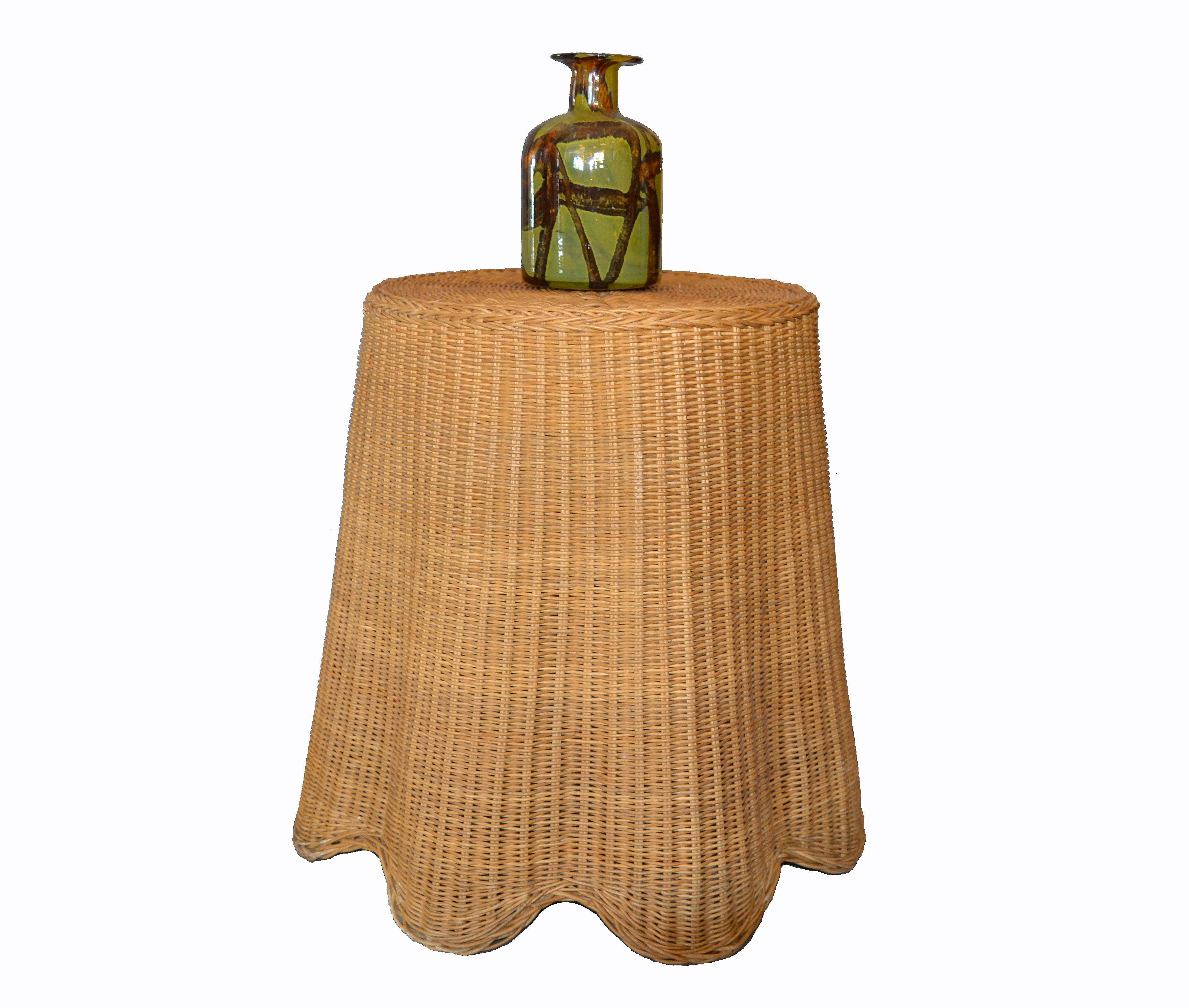 Mid-Century Modern round handwoven rattan, wicker coffee or side table. 
Exemplary construction, woven ties are firmly linked.
Florida Design for Your Sunroom or Porch.