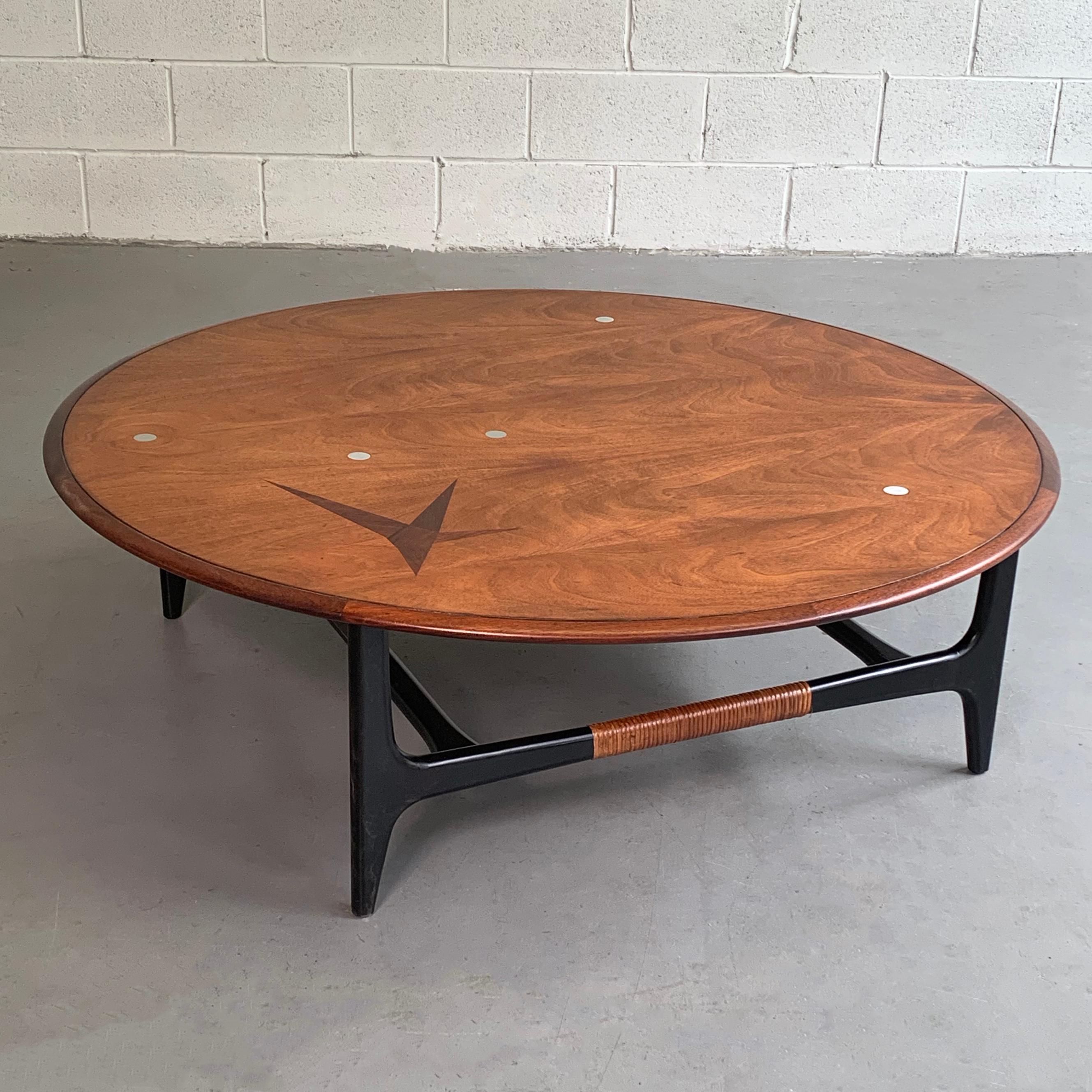 Fantastic and rare, Mid-Century Modern, round coffee table by Lane Alta Vista features a walnut top with aluminum dot and wood inlays atop a lacquered black walnut base with woven detail.