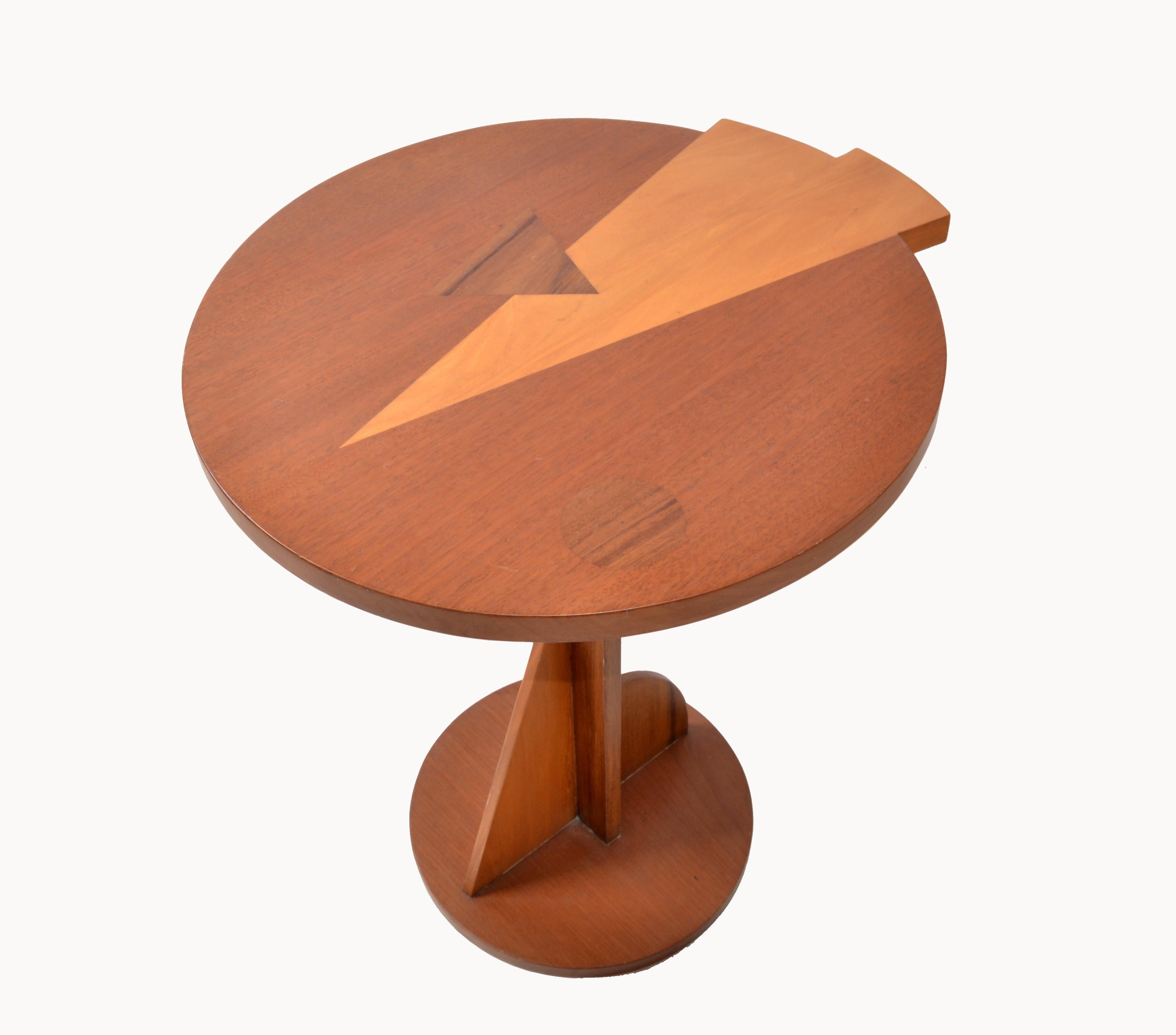 Stylish 1970s Italian side or cocktail table in mahogany wood, decorated with marquetry on the top.
Unique pedestal base made in Italy.
 
    