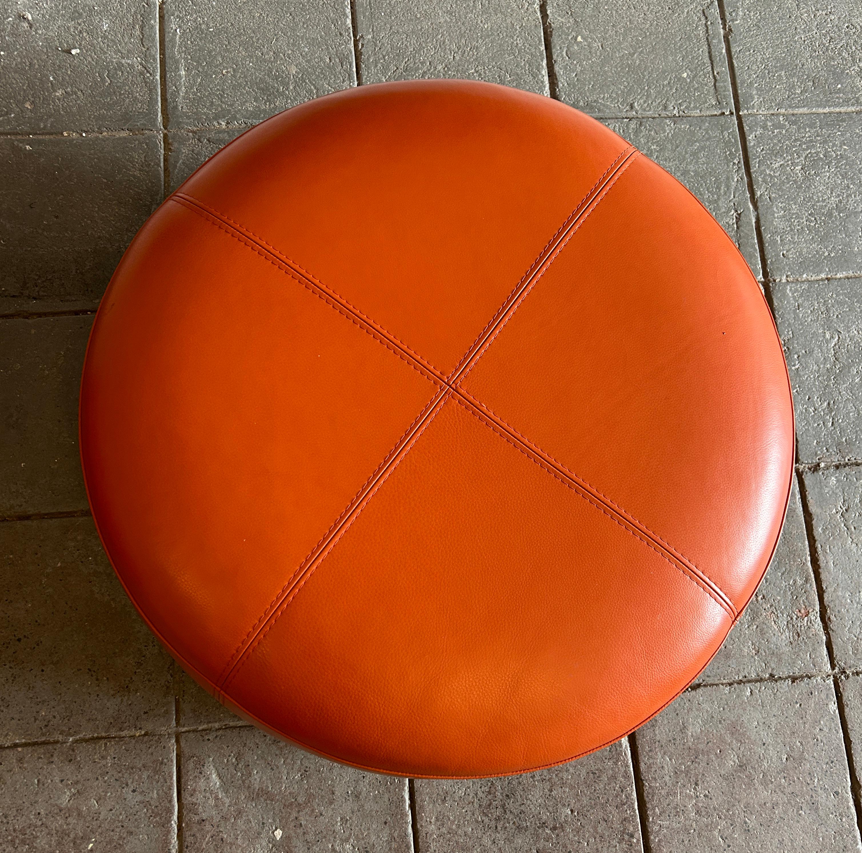 Mid-Century Modern Round Orange Leather Ottoman Stool Pouf. Very Soft Leather with small Chrome Legs. Very Clean all around. Nice stitching. No Label. Great small stool ottoman chair pouf. Great Color. Located in Brooklyn NYC.

Measures 32