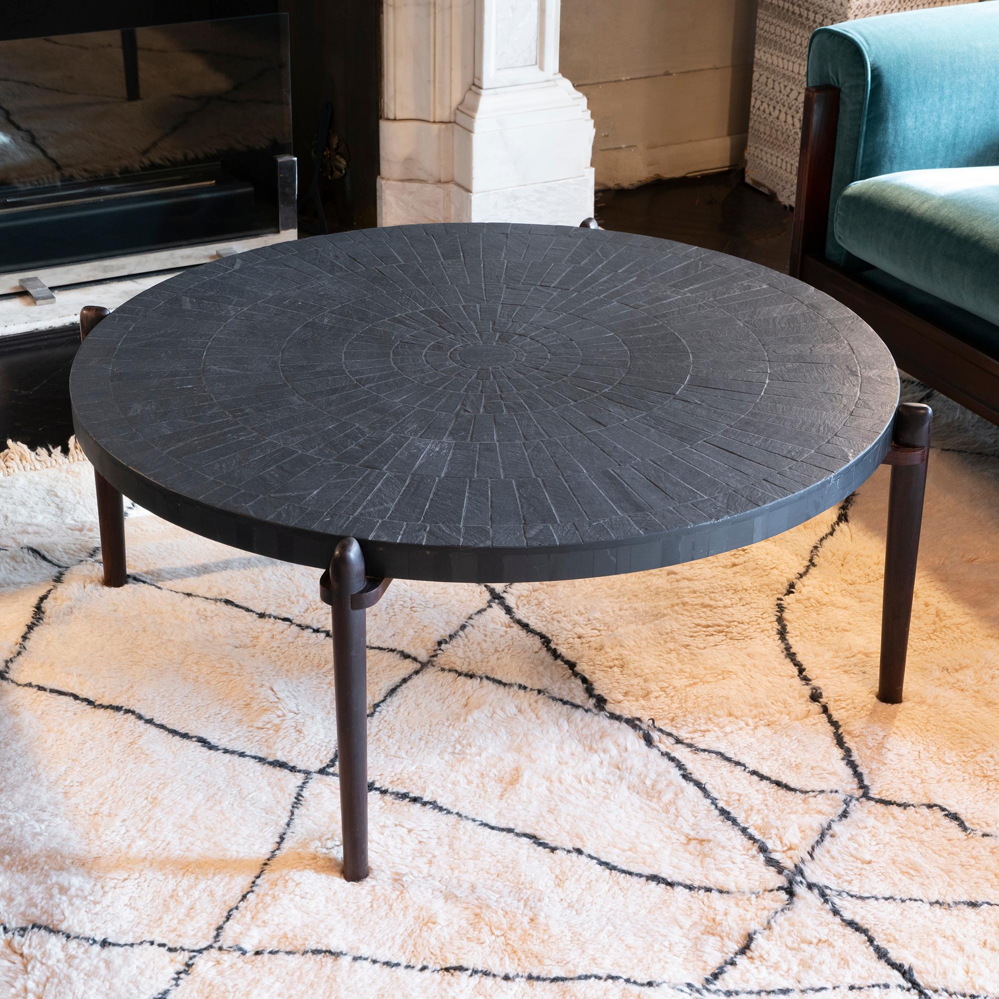 Mid-Century Modern round coffee table with inlay slate top (diameter cm110) with palisander legs, perfect condition and vintage patina, some slight chipping on the top, Belgium, 1960s.