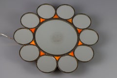 Mid-Century Modern Round Sun-Shaped Backlit Metal and Orange Glass Wall Mirror