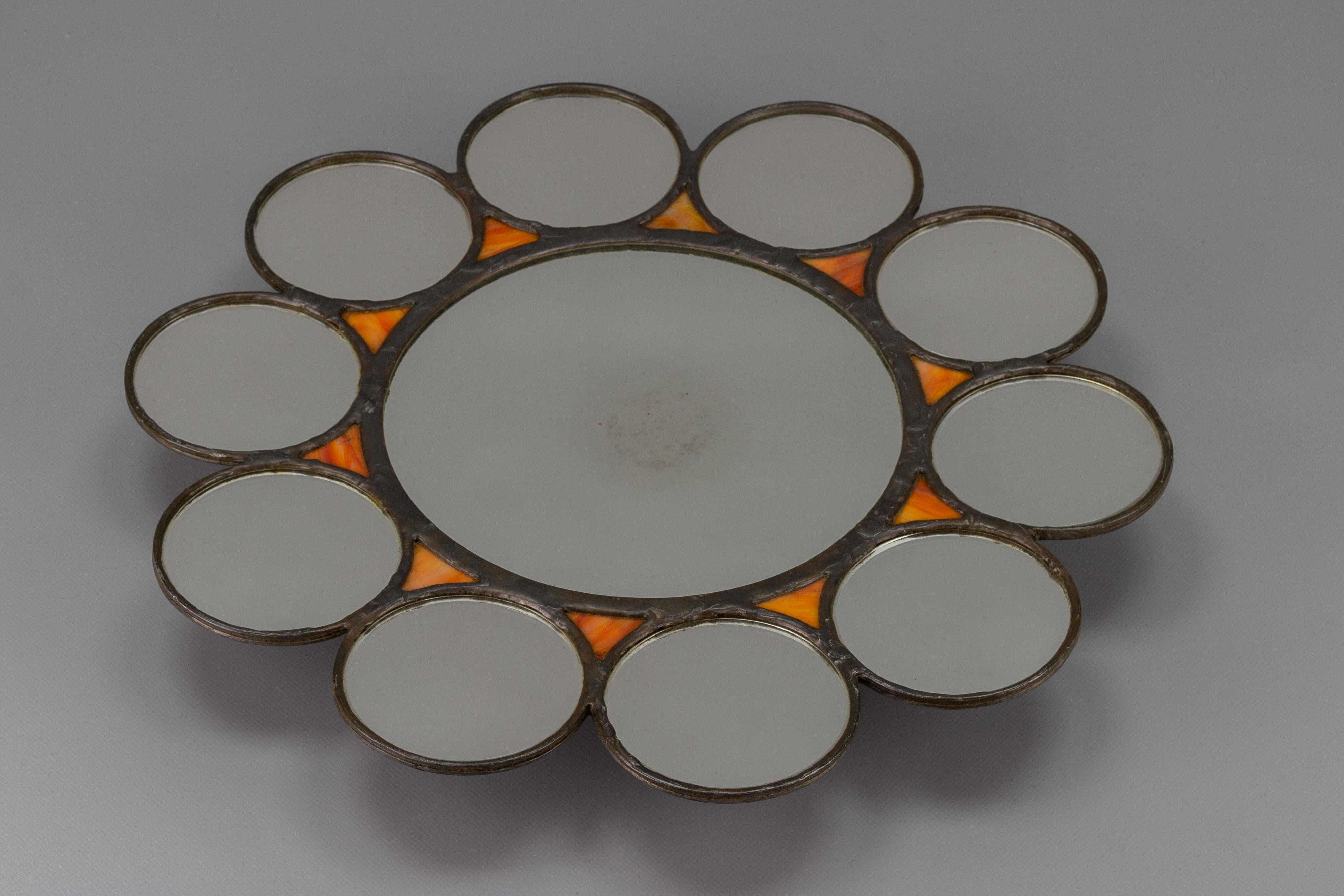German Mid-Century Modern Round Sun-Shaped Backlit Metal and Orange Glass Wall Mirror For Sale