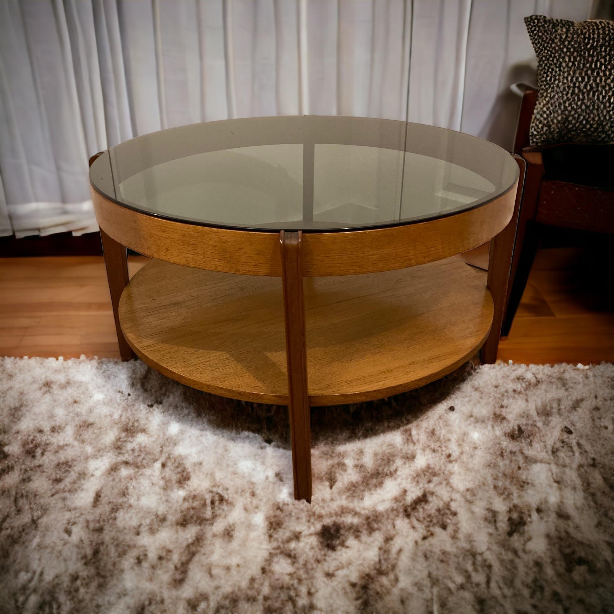 Mid Century Modern round Teak Coffee Table, smoked glass by Remploy of England. In Good Condition In Bishop's Stortford, GB