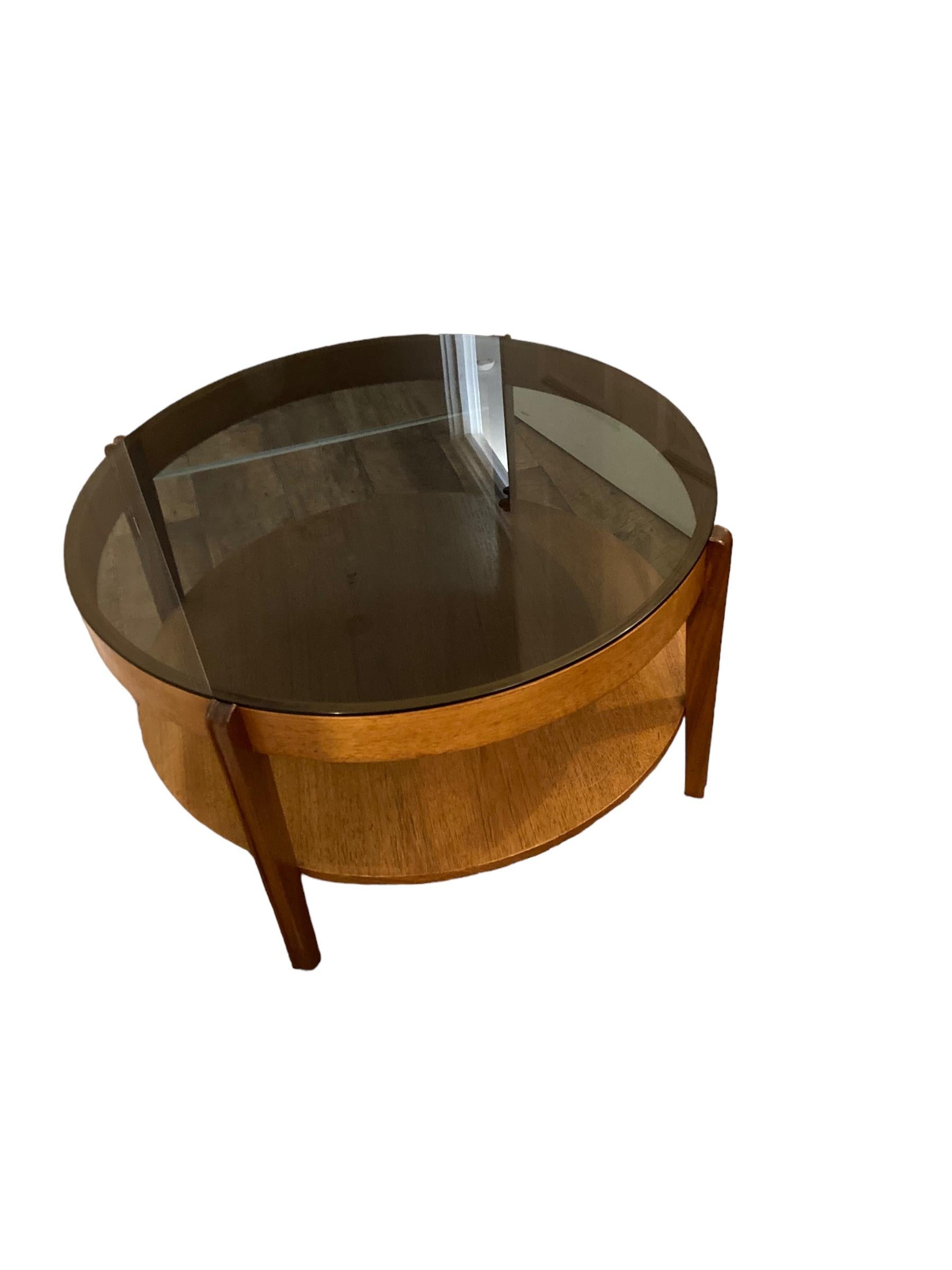 Mid Century Modern round Teak Coffee Table, smoked glass by Remploy of England. 1