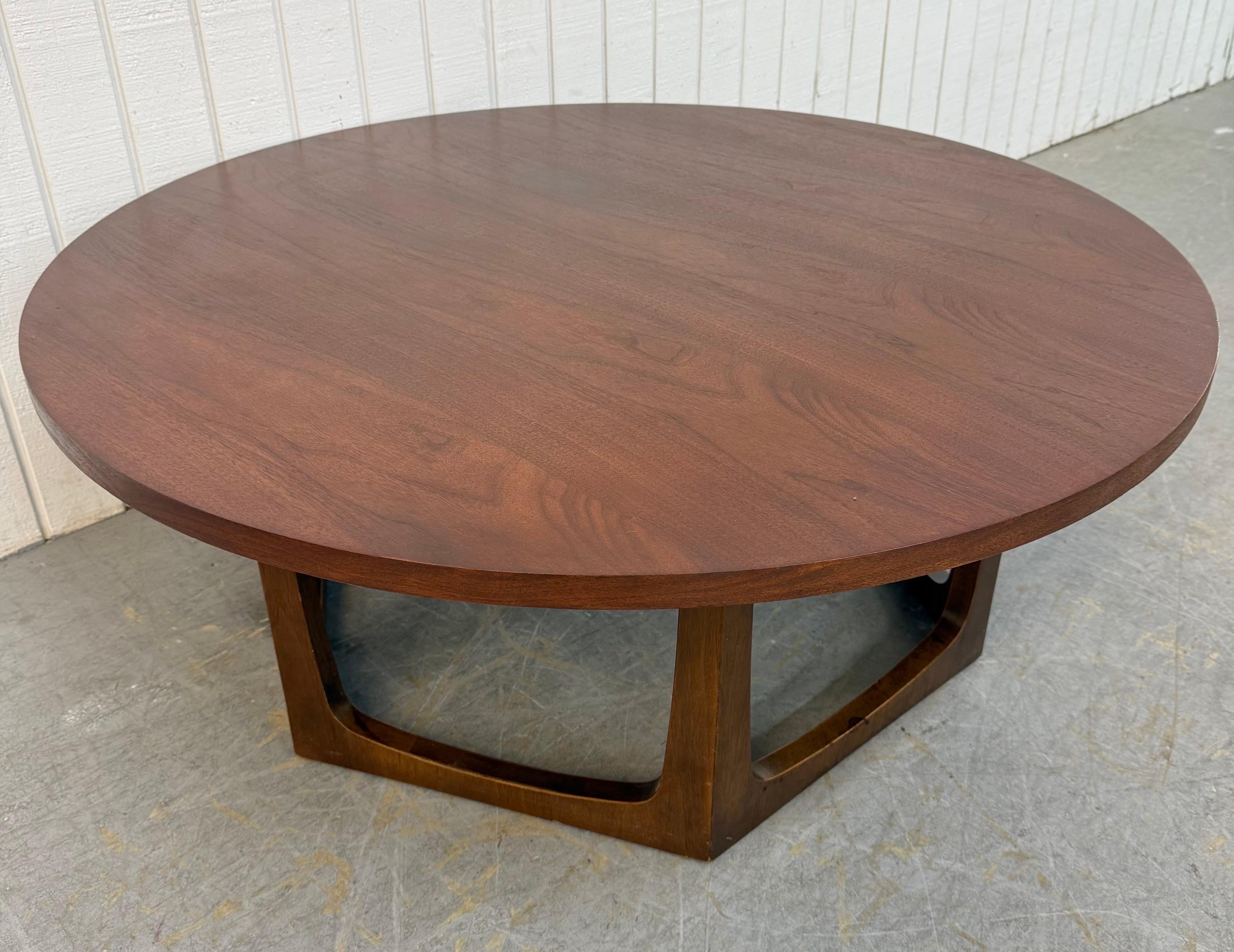 This listing is for a Mid-Century Modern Round Walnut Coffee Table. Featuring a 42