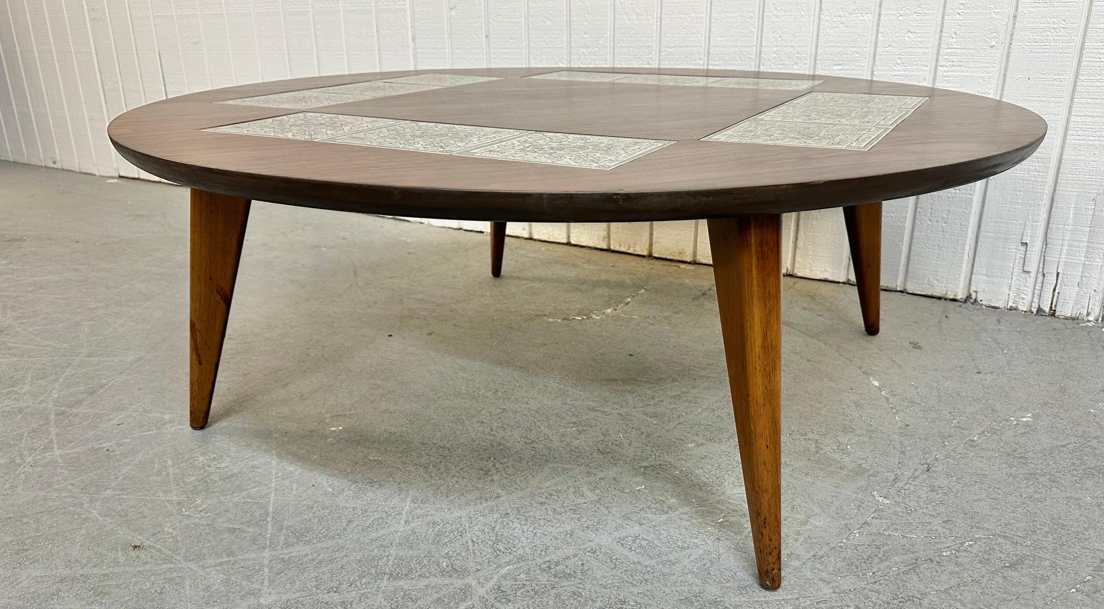 This listing is for a Mid-Century Modern Round Walnut Tile Top Coffee Table. Featuring a round walnut top, Aztec style tiles, modern legs, and a beautiful walnut finish. This is an exceptional combination of quality and design!
