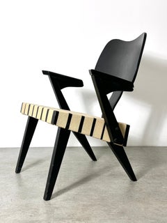 Chaise longue en bois noir à sangles Russell Spanner Modernity 1950s