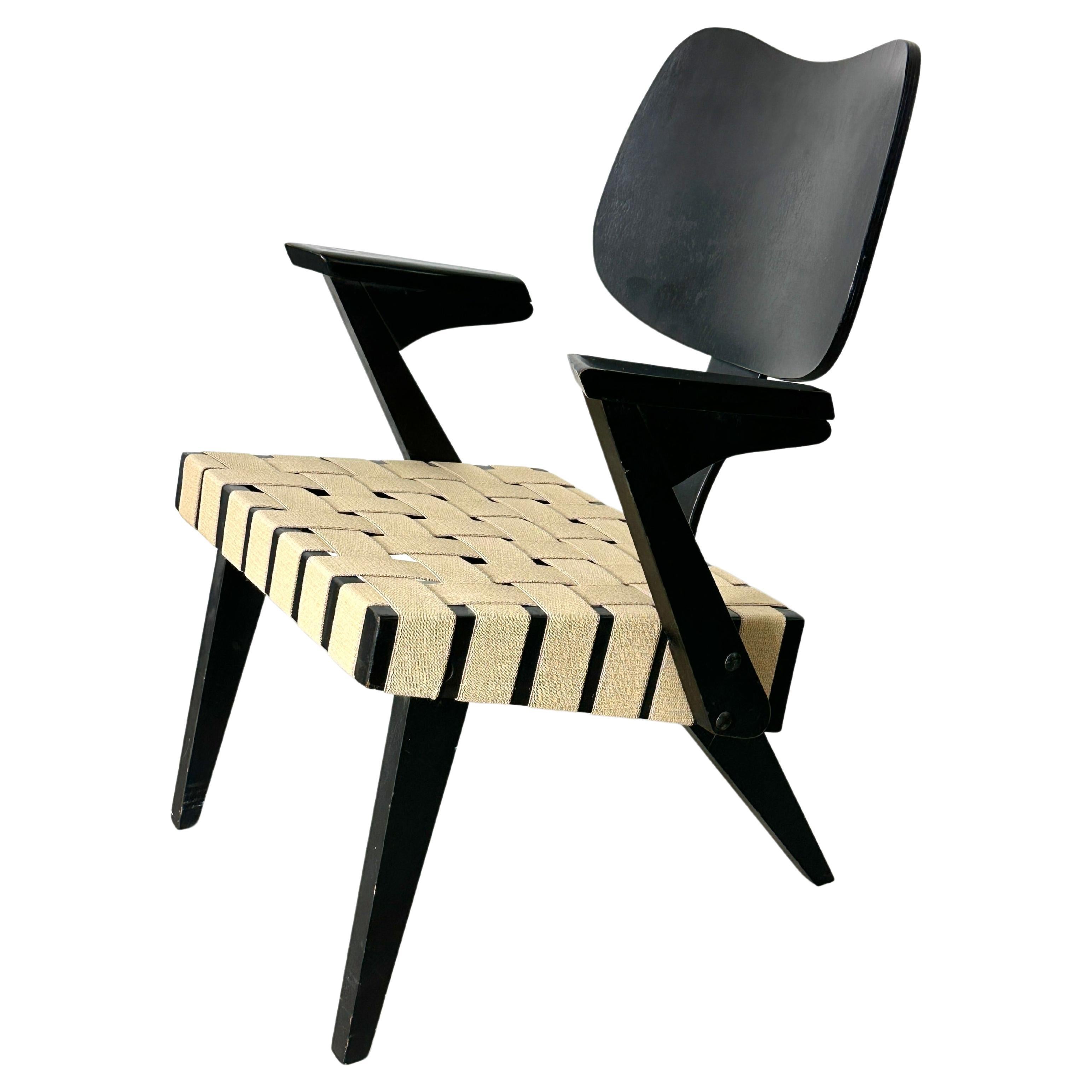 Mid Century Modern Russell Spanner Ruspan Black Wood Webbed Lounge Chair 1950s