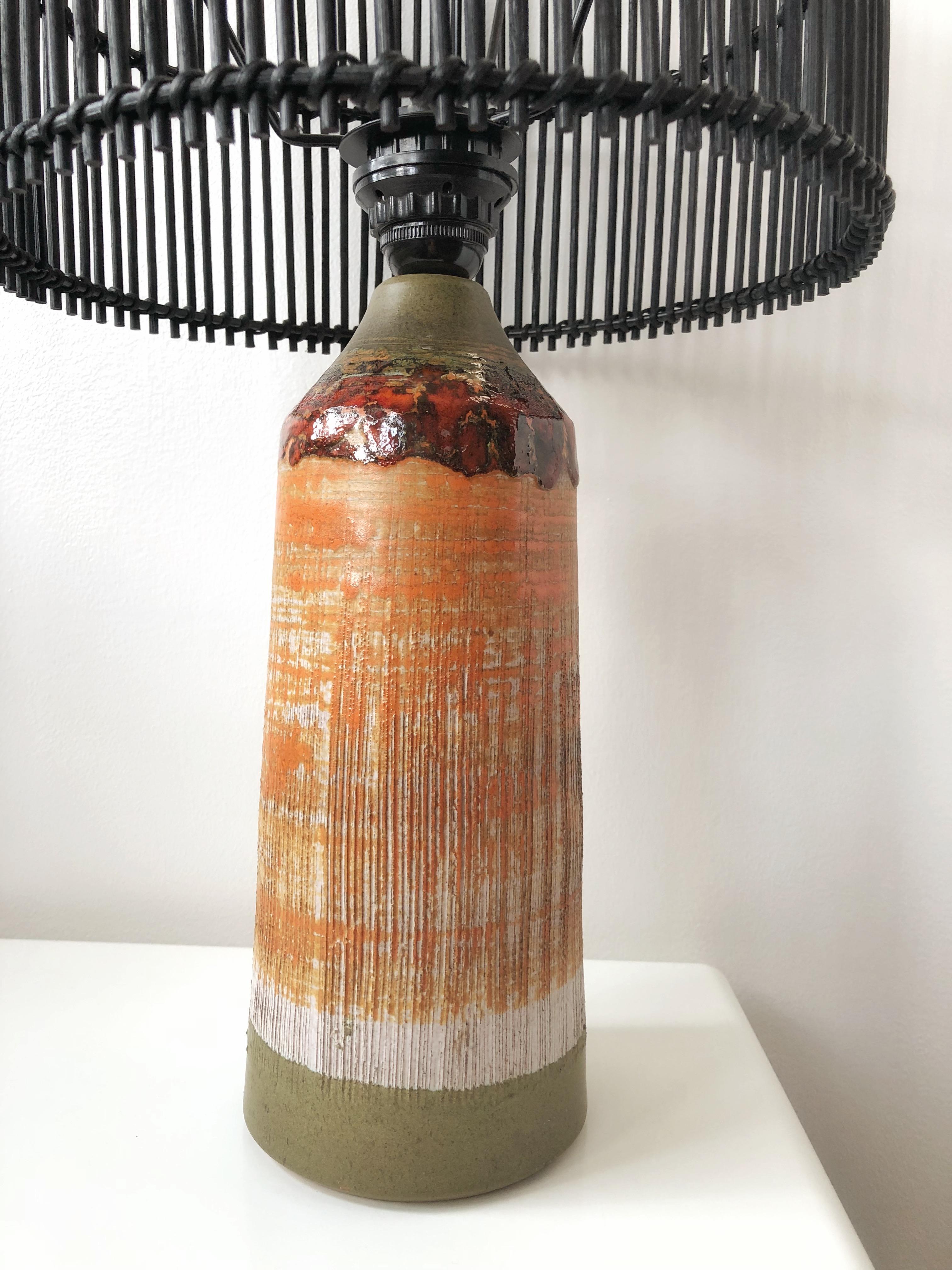Swedish Modern tall, massive, brutalist block colored ceramic lamp by Tilgman Keramik.
European wiring, rewiring on request.
Very good condition but a small flake is lost under the lamp base, this small damage is retushed and painted green, see last