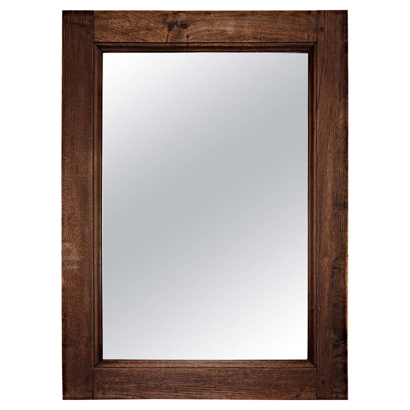 Mid-Century Modern rustic wood mirror.

Manufactured in France, circa 1960.

In original condition with minor wear consistent of age and use, preserving a beautiful patina.

Materials: 
Wood 

Dimensions: 
D 2.7 cm x W 62 cm x H 84.5 cm.

Important