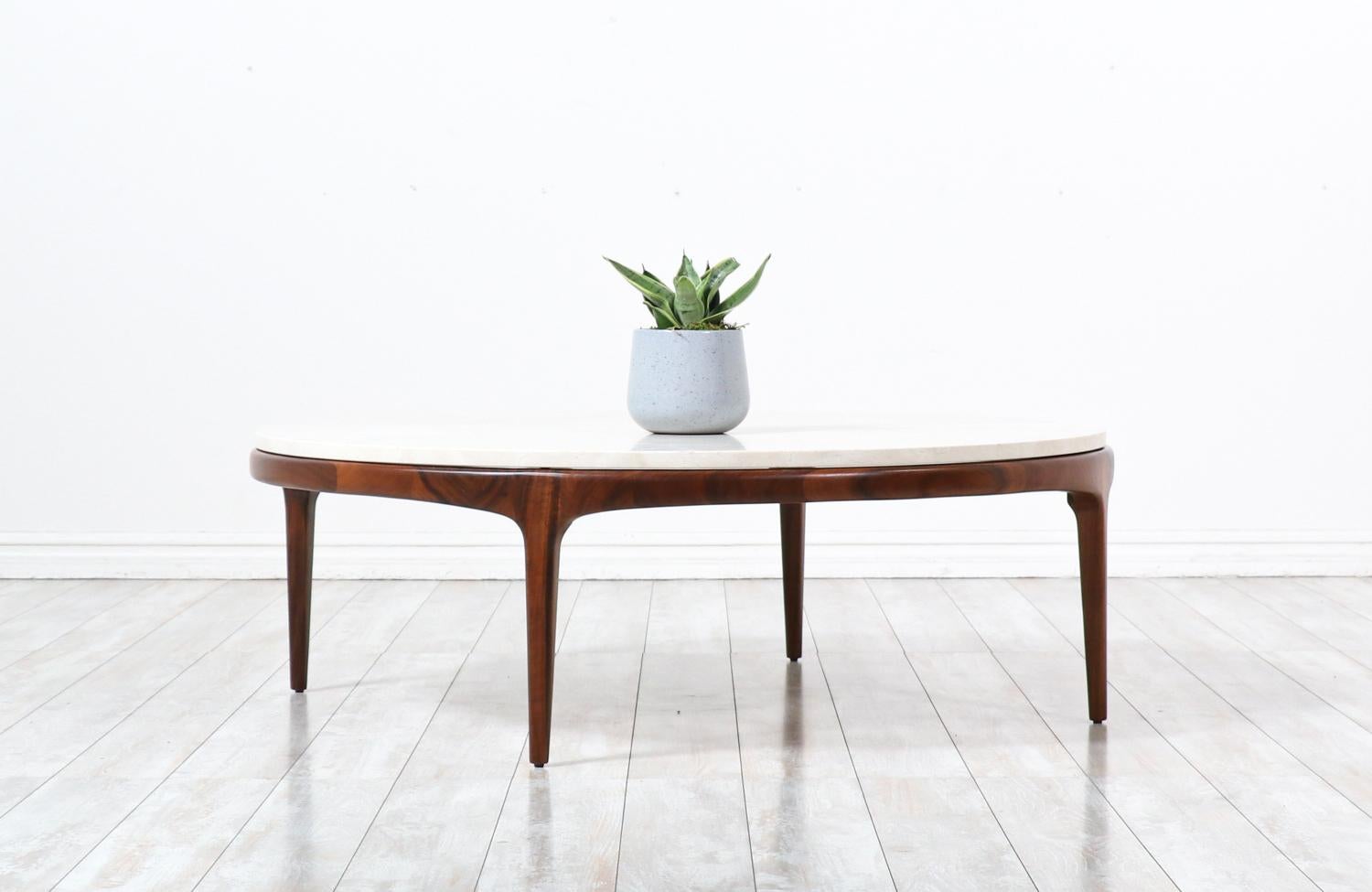 Mid-Century Modern “Rythm” coffee table with Crema Marfil Stone Top by Lane.