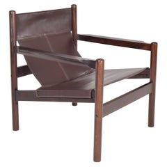 Fauteuil Roxinho en cuir et bois Safari, style moderne du milieu du siècle dernier, par Michel Arnoult