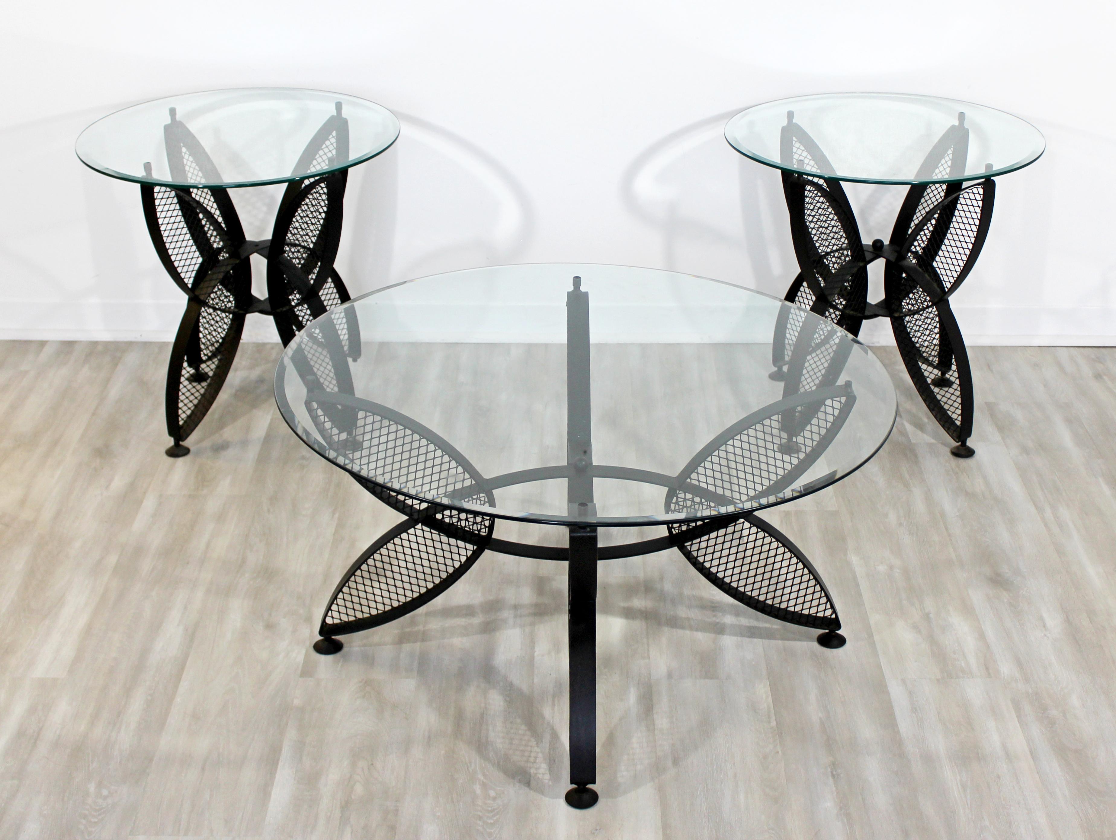 For your consideration is a gorgeous set of three, iron butterfly patio tables with glass tops, a pair of side tables and a coffee table, by Maurizio Tempestrini for Salterini, circa 1960s. In good vintage condition, but missing some hardware. The