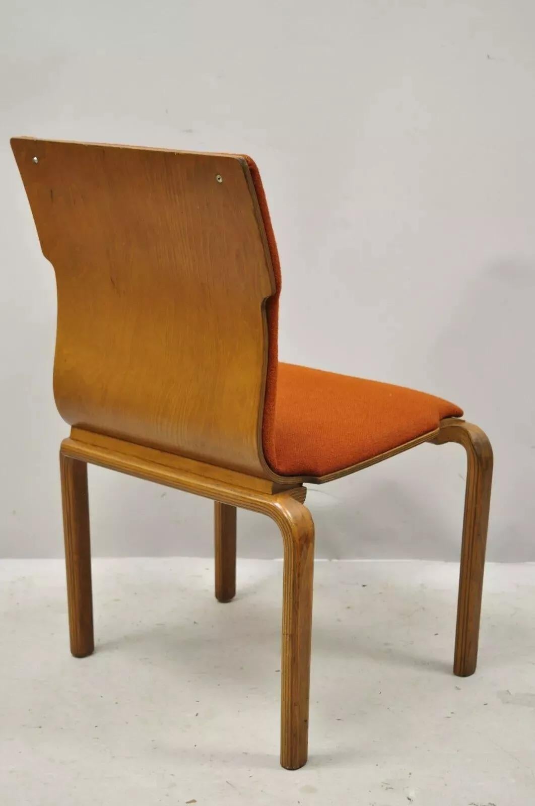 Vintage Mid Century Modern Bentwood Orange Stacking Dining Side Chair by Sanders. Item features laminated bentwood frame, staggered legs, original orange upholstery, clean modernist lines, sleek sculptural form. Circa Mid 20th Century. Measurements: