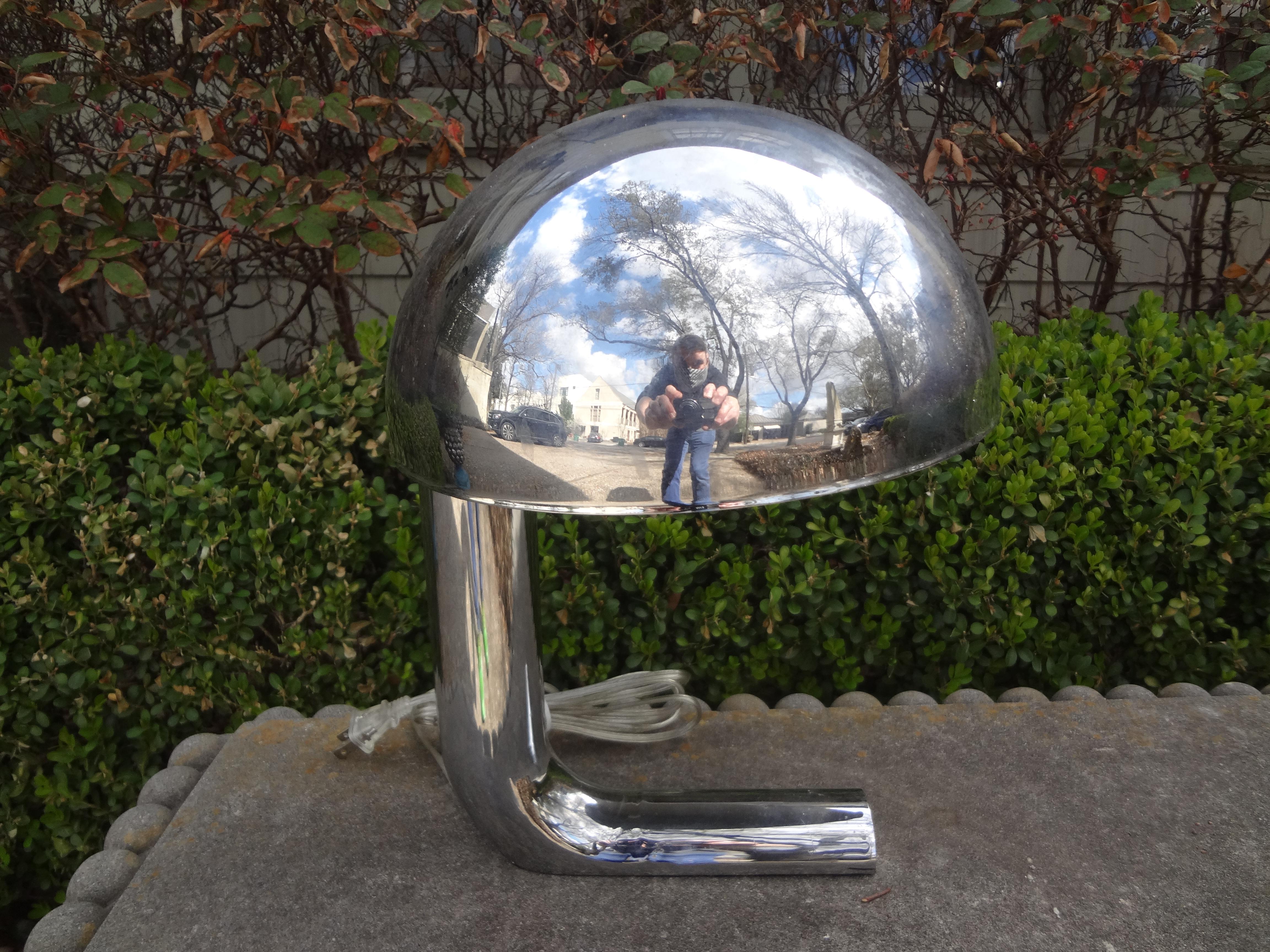 Mid-Century Modern Sarfatti for Arteluce style chrome desk lamp.
Unusual Mid-Century Modern chrome mushroom desk lamp in the manner of Sarfatti for Arteluce. This stylish chrome desk lamp is most likely Italian in origin. It has been newly wired to