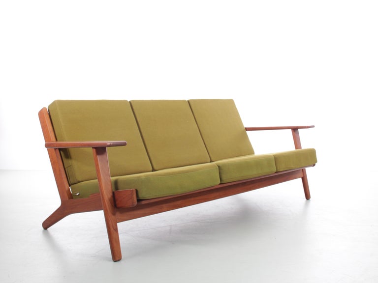 Mid-Century Modern scandinavian 3 seat sofa model GE 290 by Hans Wegner for GETAMA. Solid teak. Origianl cover. Comes with few spots and scratches. Seats can be reupholtered with fabric of your choice.