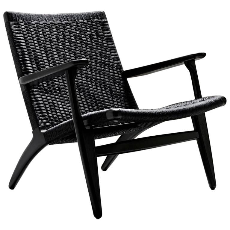 Fauteuil scandinave moderne du milieu du siècle en chêne modèle CH 25 de Hans Wegner