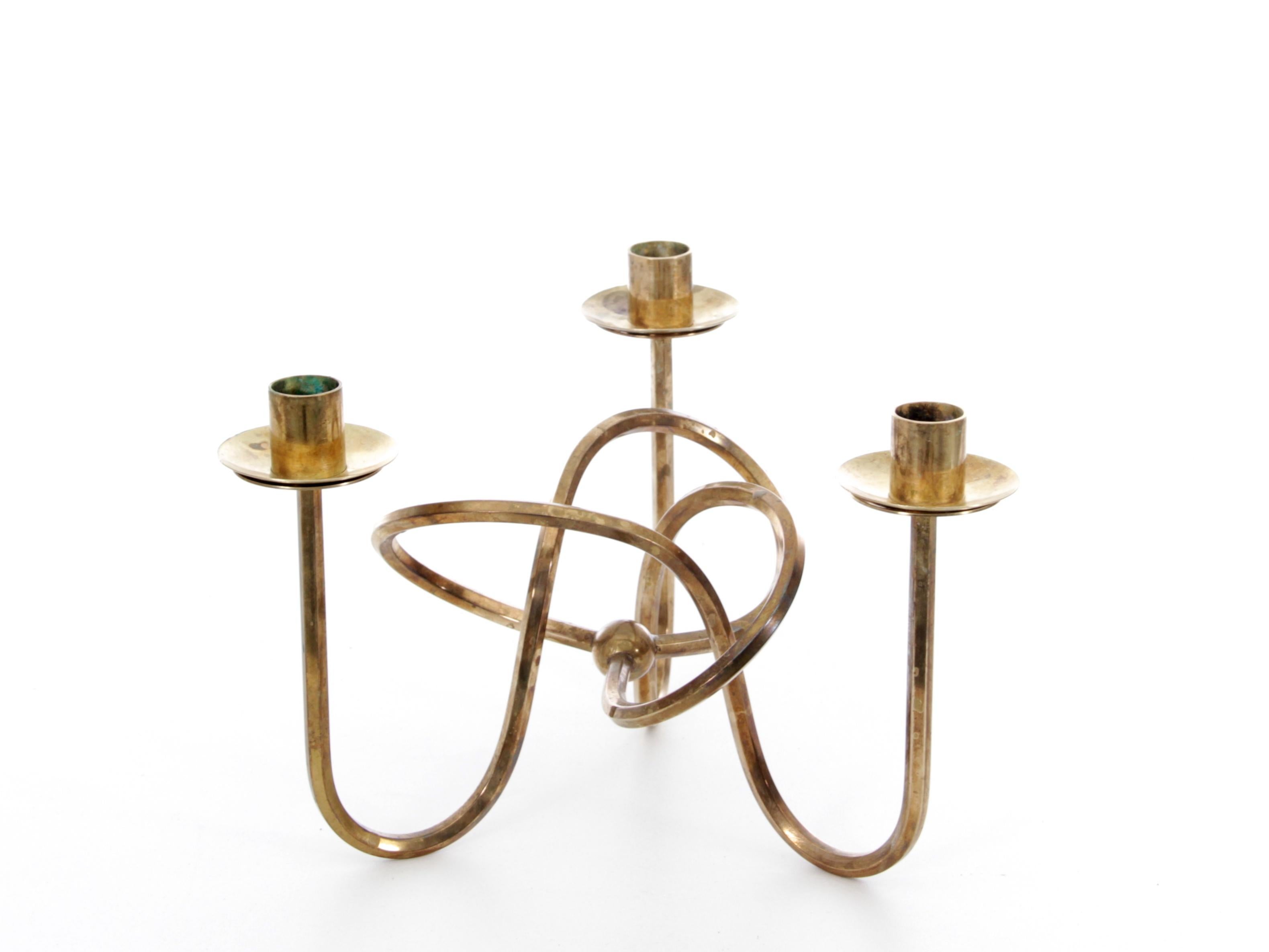 Mid-Century Modern Scandinavian candlestick in brass by Josef Frank. Item frolm the 60's.