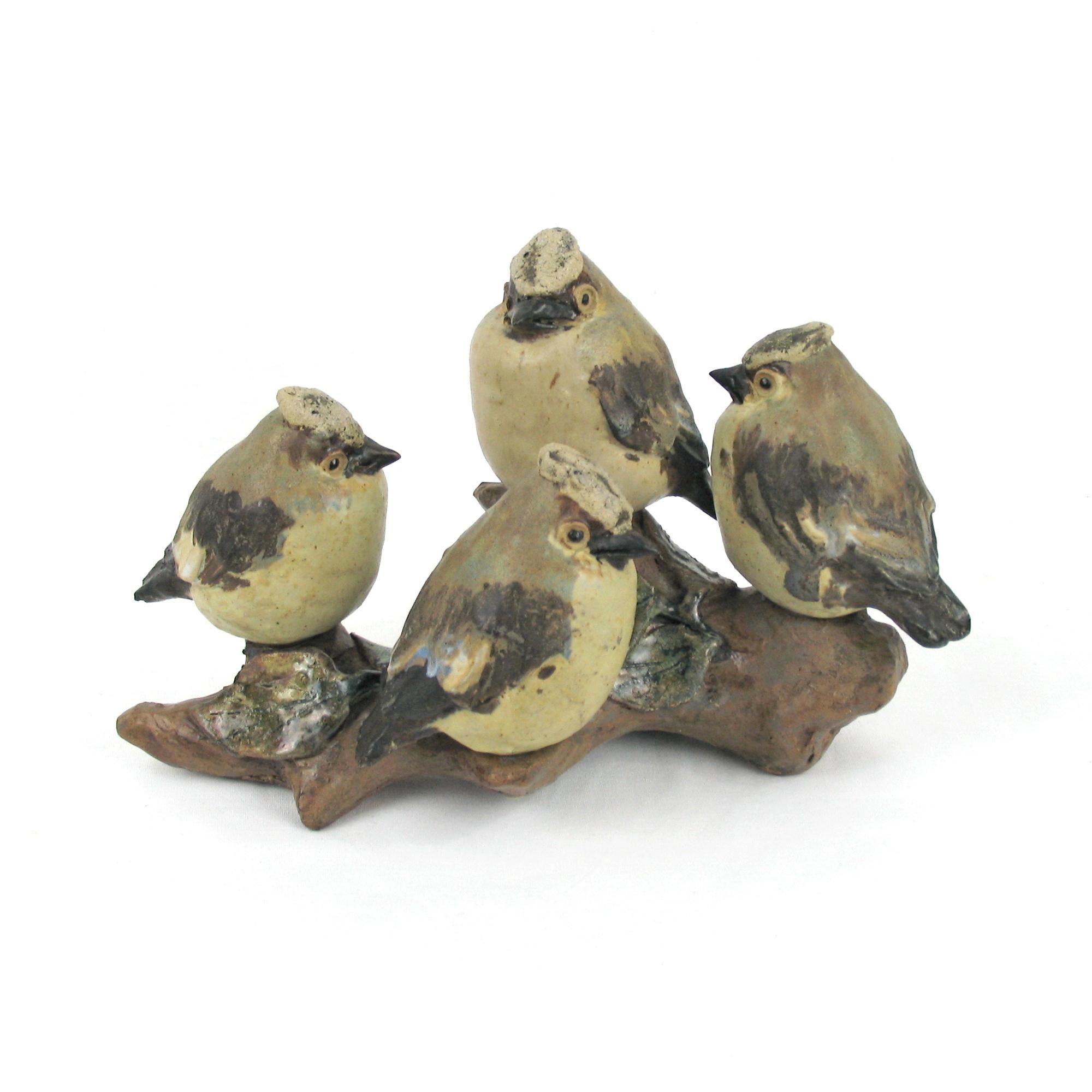 Mid-Century Modern Scandinavian ceramic birds sculpture, Sweden, 1960s.
Group sculpture of four joyful birds, sparrows, made of stoneware, in natural color, partly glazed in beautiful shades of blue. Signed under the bottom. In excellent