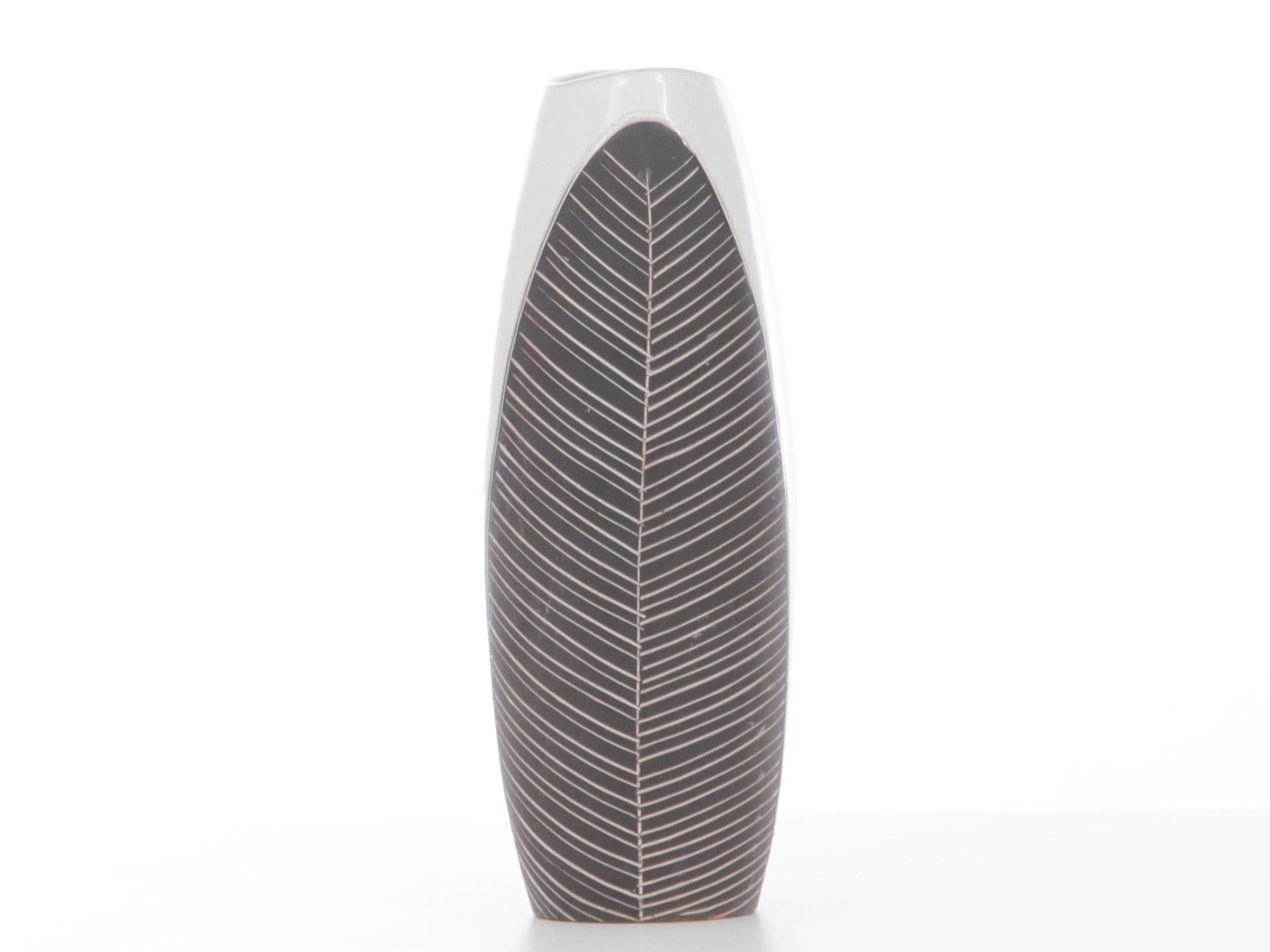 Mid-Century Modern Scandinavian ceramic vase with leaves pattern. Swedish work.