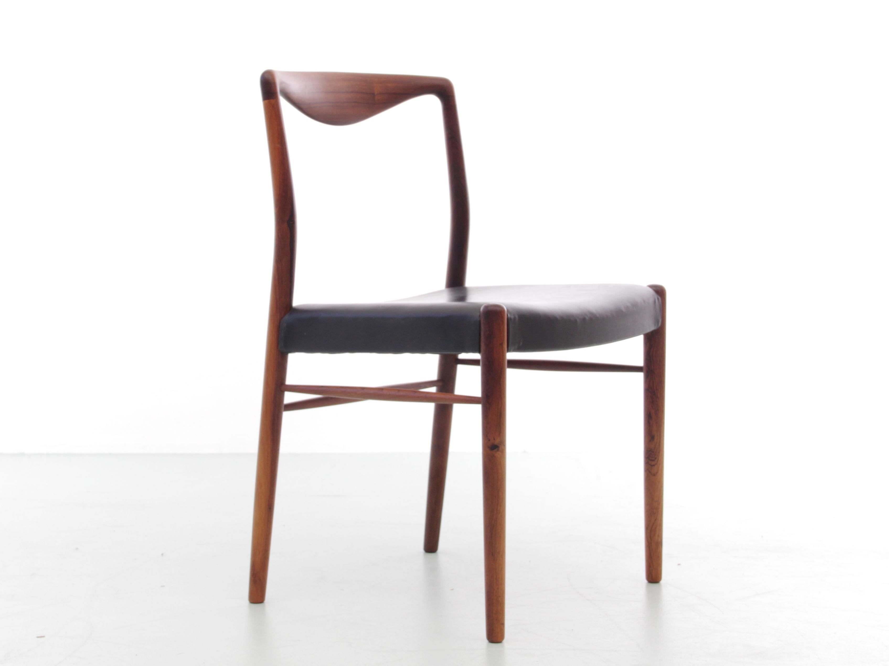 Mid-Century Modern scandinavian chair in rosewood by Kai Lyngfeldt-Larsen for Søren Willadsen. Original seat in black simili leather.