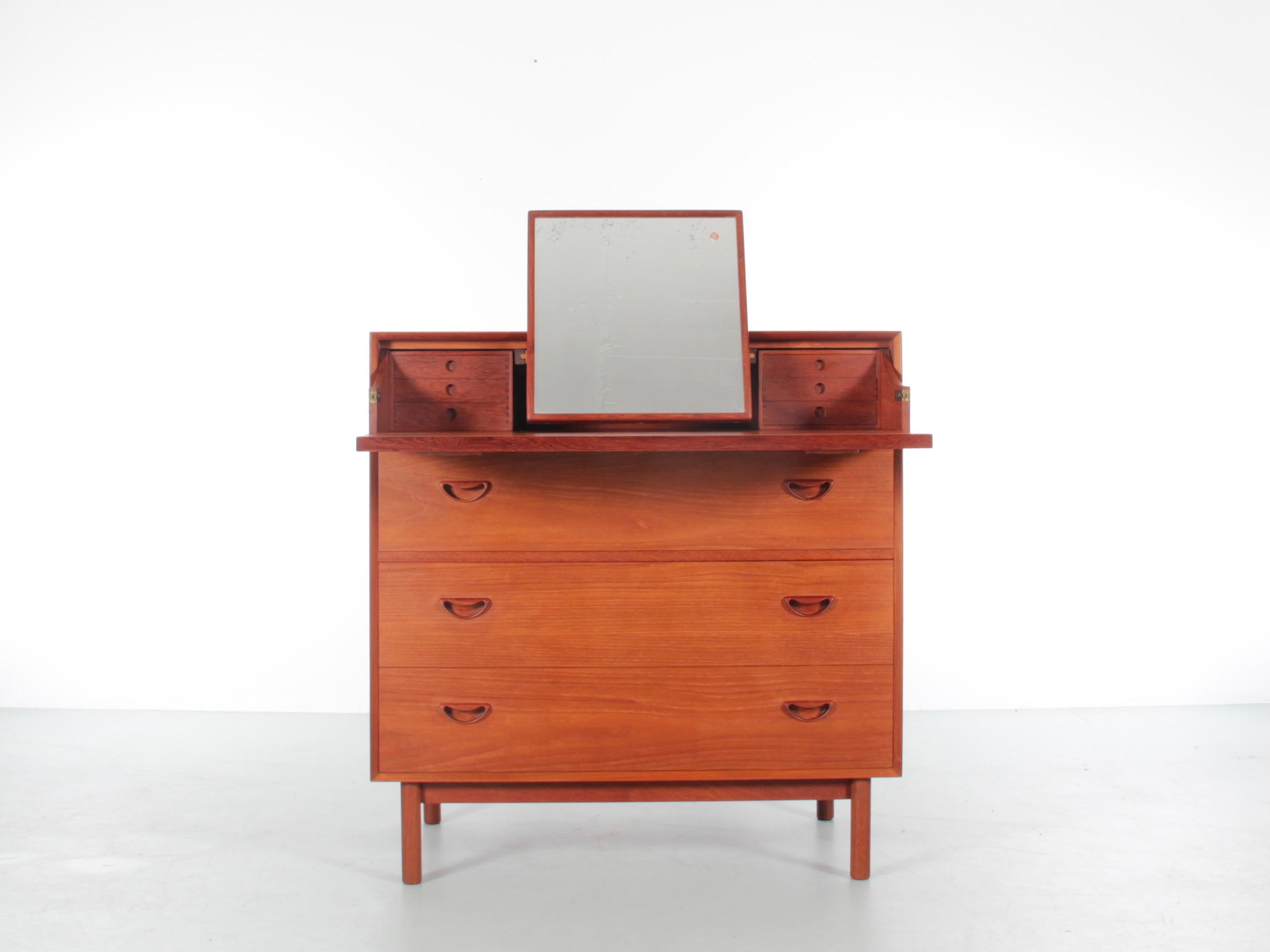 Solid teak chest of drawers by Peter Hvidt and Orla Mølgaard Nielsen with secretary hidden in the first drawer.