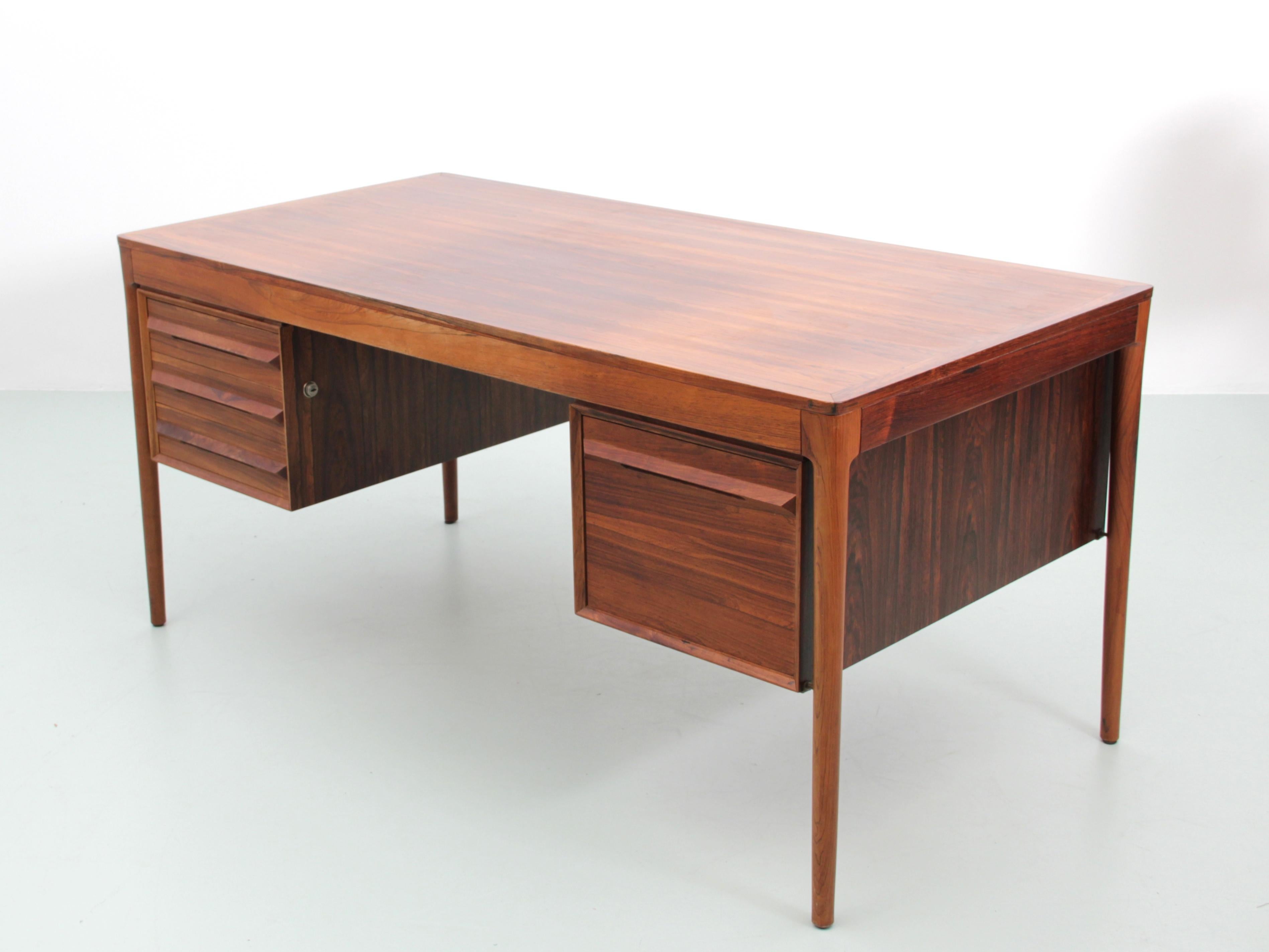 Mid-Century Modern scandinavian desk in rosewood by Torbjørn Afdal. Come with original keys.