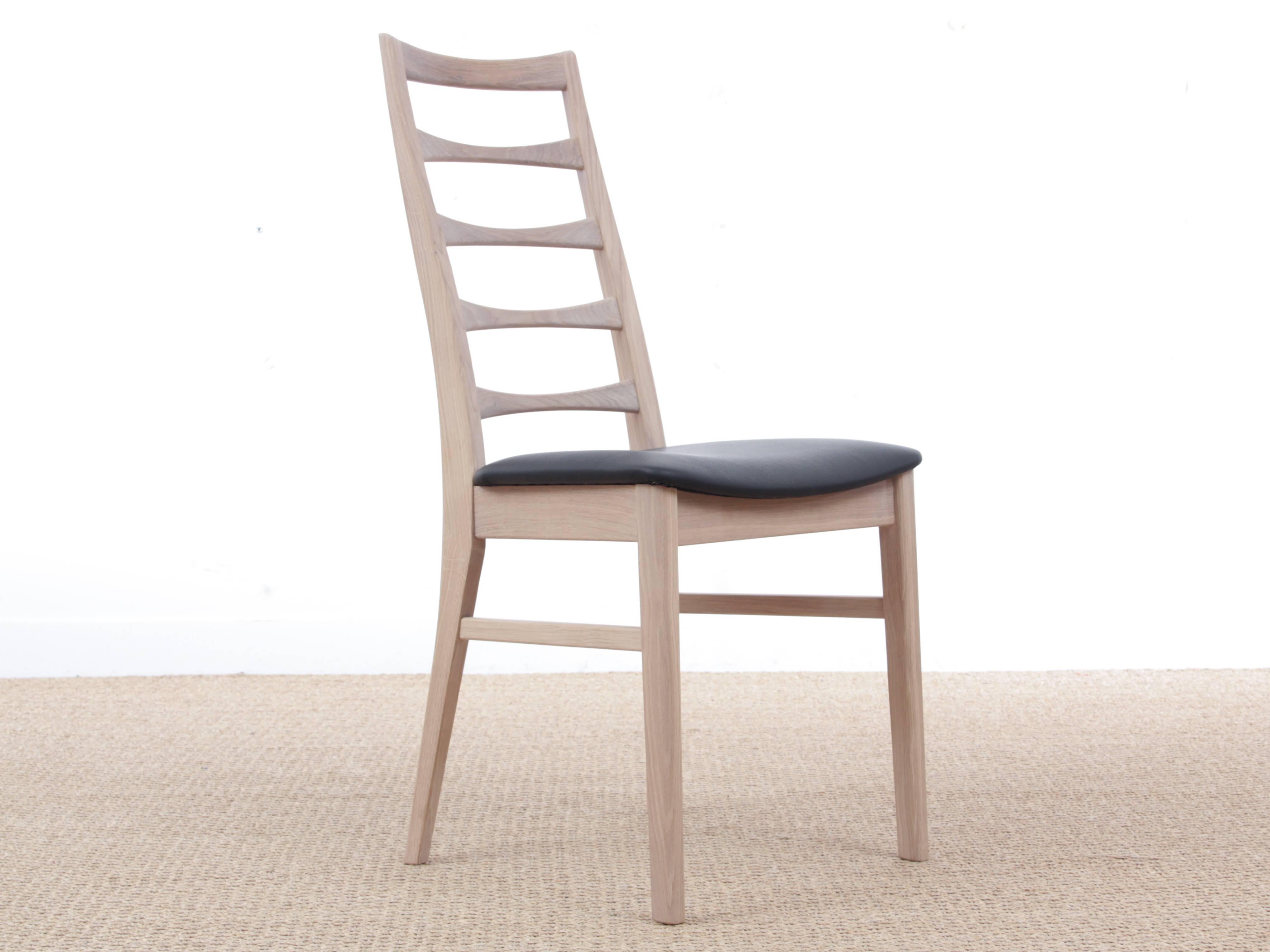 Mid-Century Modern Scandinavian dining chair model Liz by Niels Koefoed, new edition. Liz came to the world in 1961, but the years have not tarnished her - she is still a good seller.

