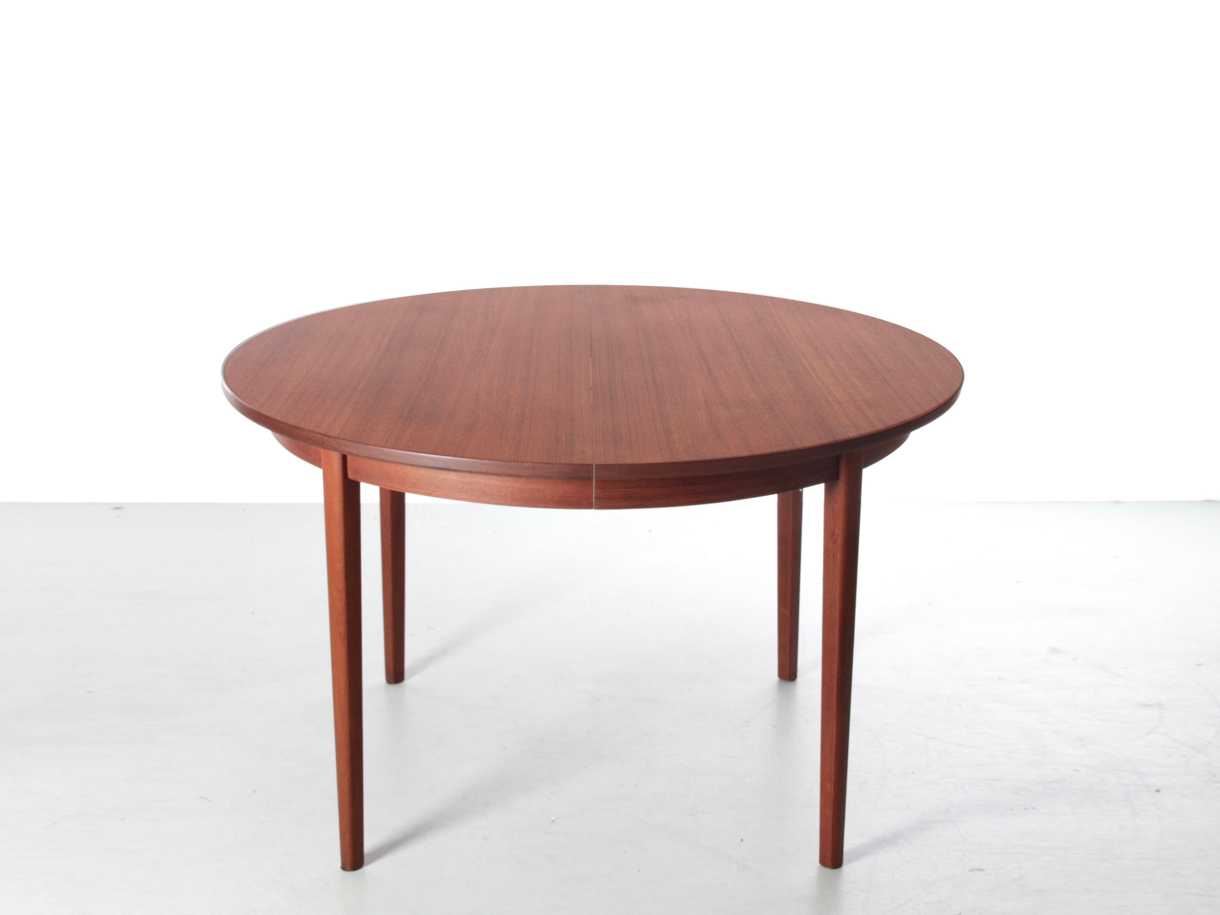 Mid-Century Modern scandinavian dining table in teak with 2 extra leaves. Made in sweden in the 60's.