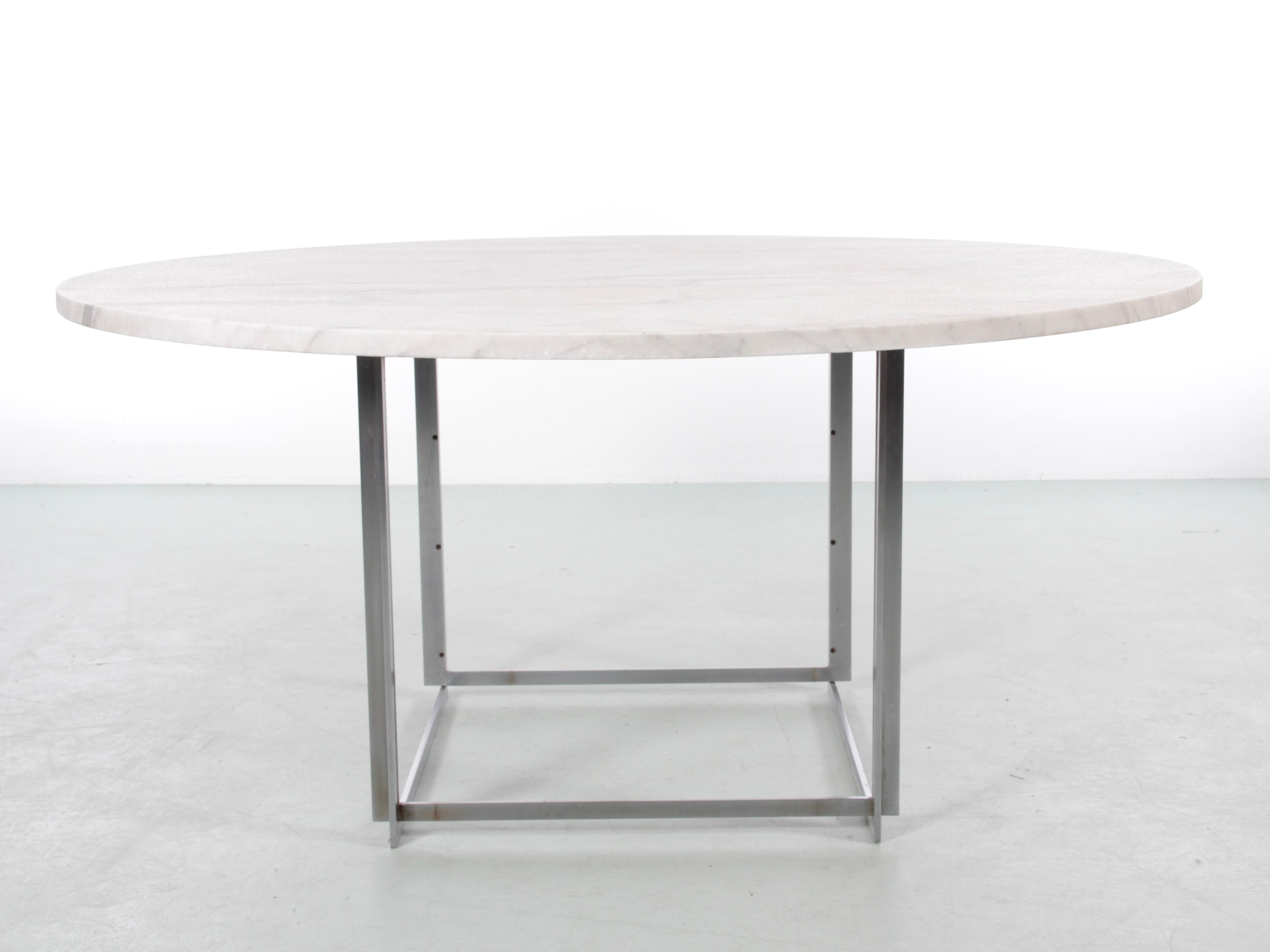Mid-Century Modern scandinavian dining table PK-54 by Poul Kjaerholm for Kold Christensen.

Carrara marble tabletop with a pitted surface. Perfect condition, with a few rare small restored chips.

Includes its 6 maple extensions, along with the