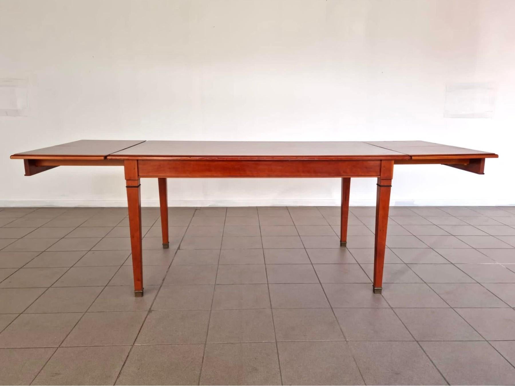 Dimensions: H 30.2” x W 58.6”/92.6” x D 35”

Mid-century Modern style Danish dining or conference table. The table is expandable by pulling out two extra leaves. The rectangular table teak surface with stylish lined inlays on the top surface, raised