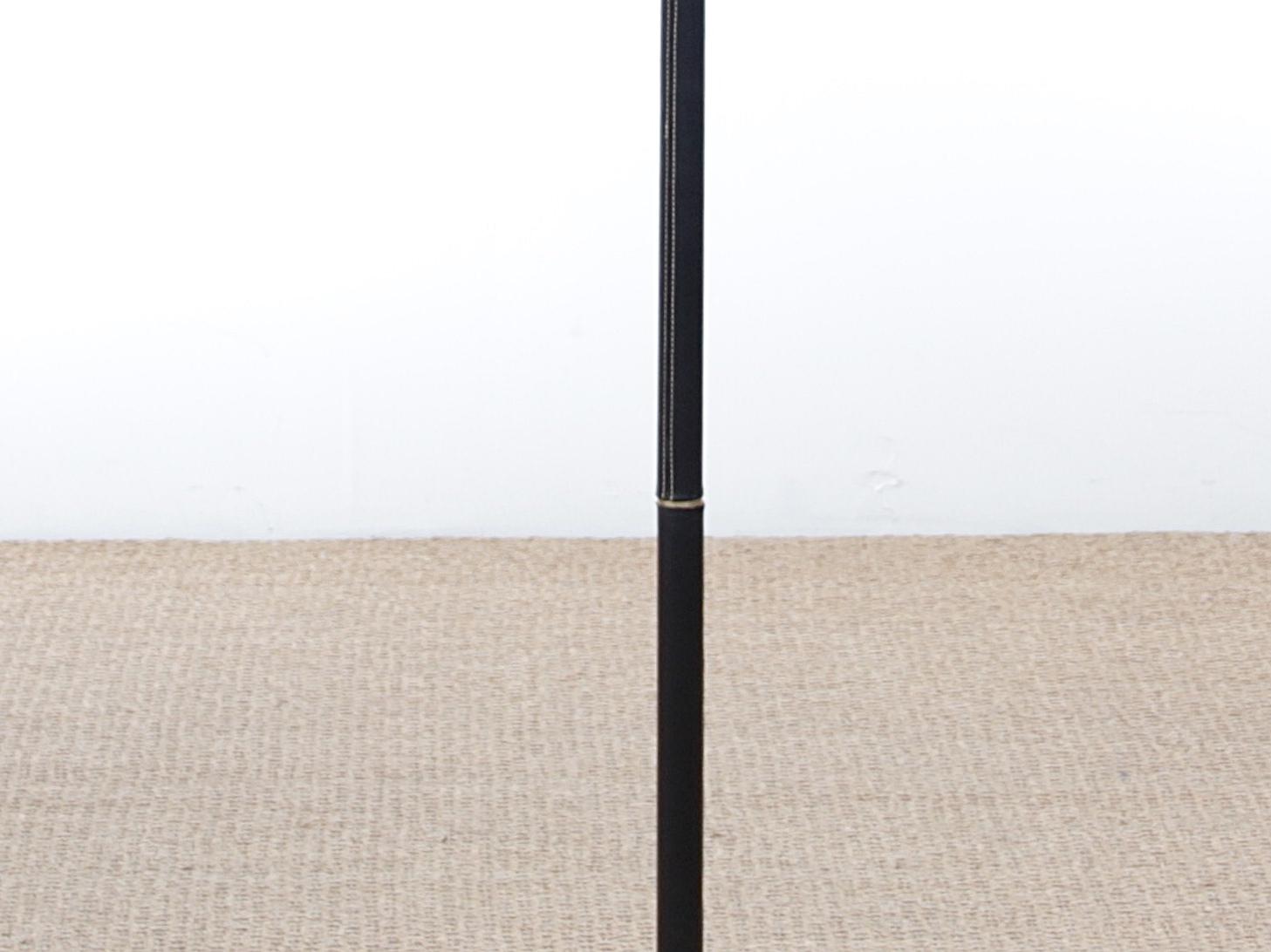 Mid-Century Modern Scandinavian floor lamp in brass and black leather. New electrical system brought up to EU standard. E27 bulb. Shade not included.