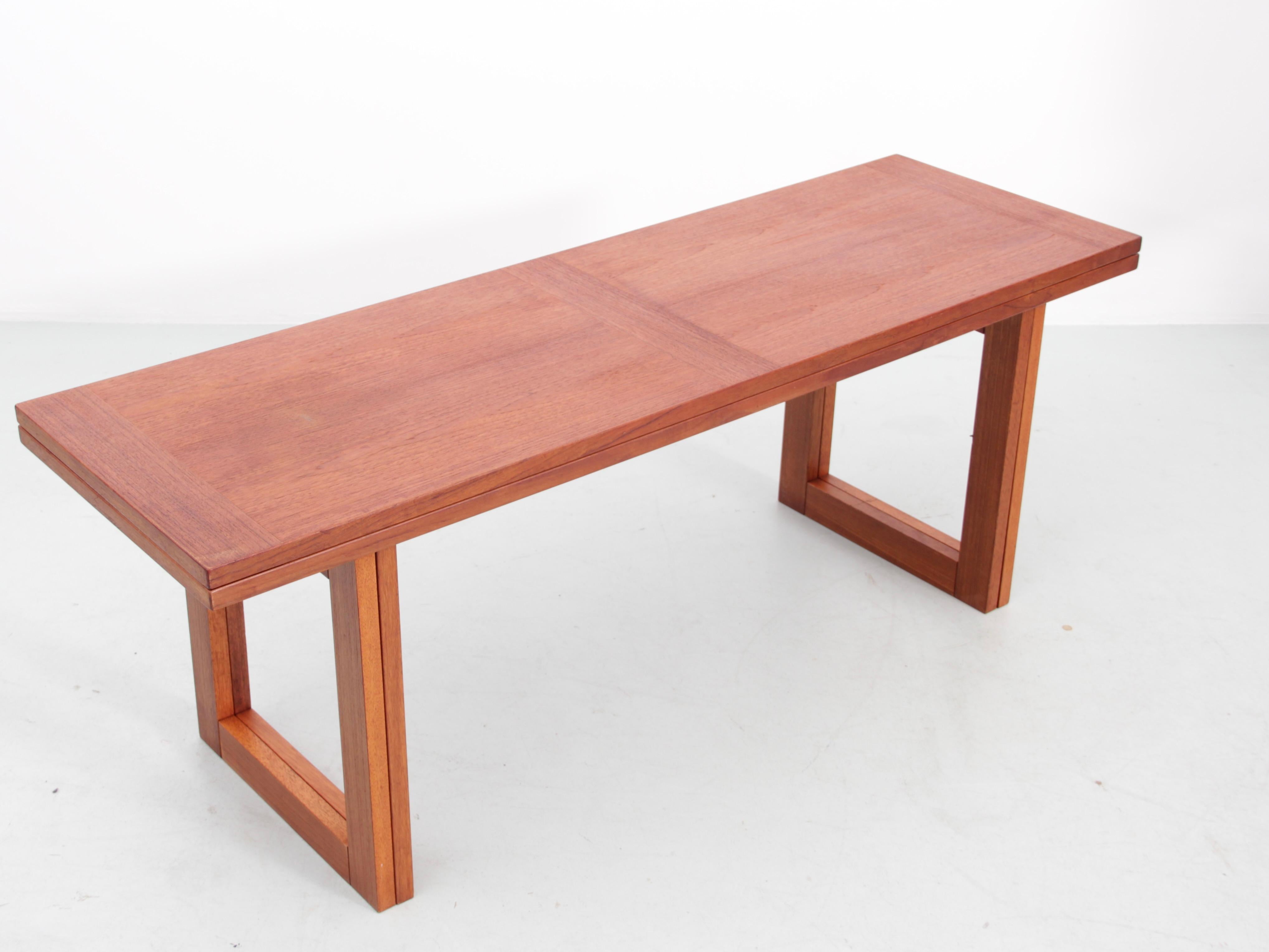 Mid-Century Modern scandinavian folding coffee table in teak. 


Dimensions : Closed : H 51 cm. W 139,5 cm. D 43 cm. Unfolded : H 49 cm. D 86 cm. W 139,5 cm
